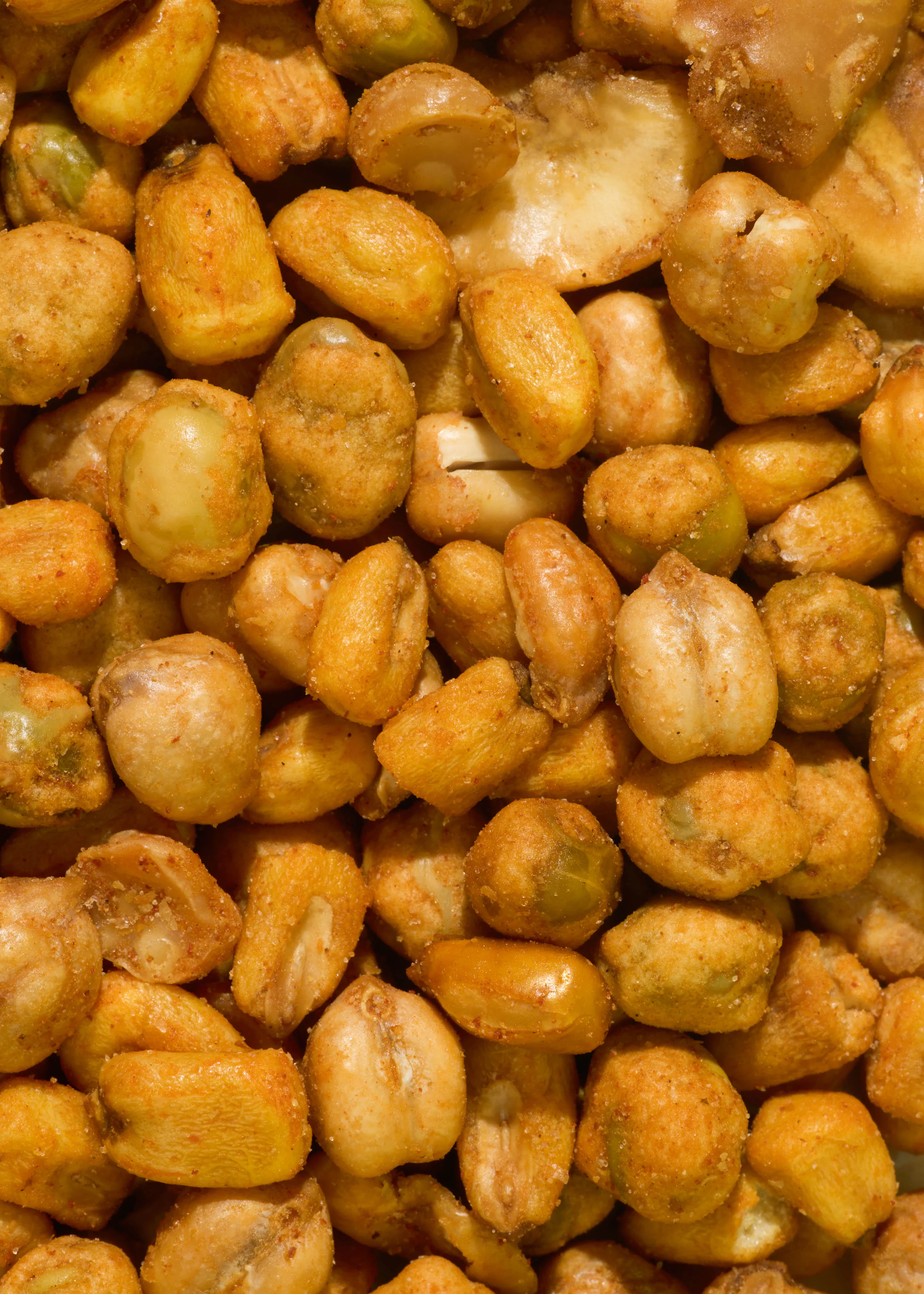 a close up of a pile of fried corn