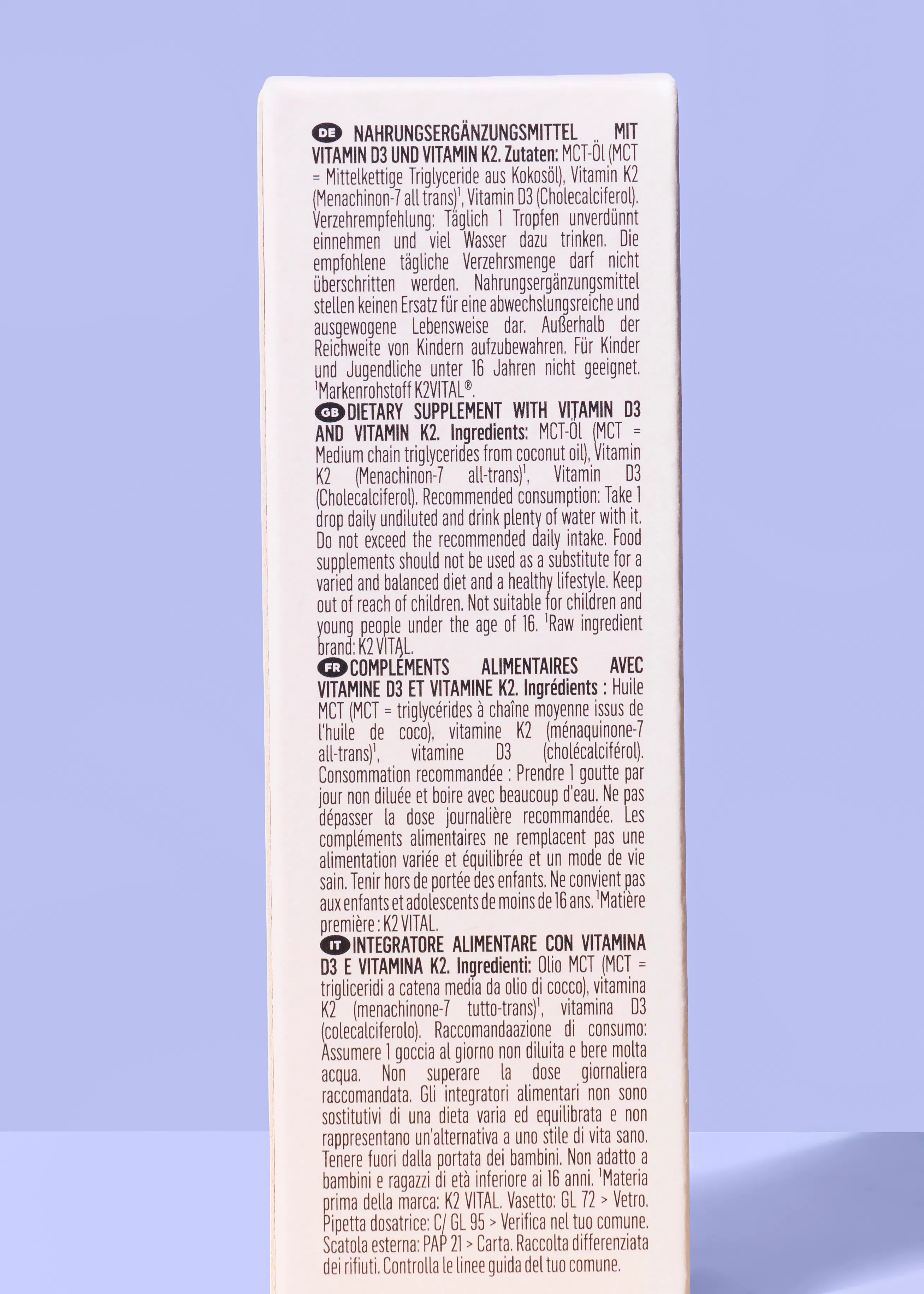 a product label with information in german, english, french, and italian for a vitamin d3 and vitamin k2 dietary supplement.