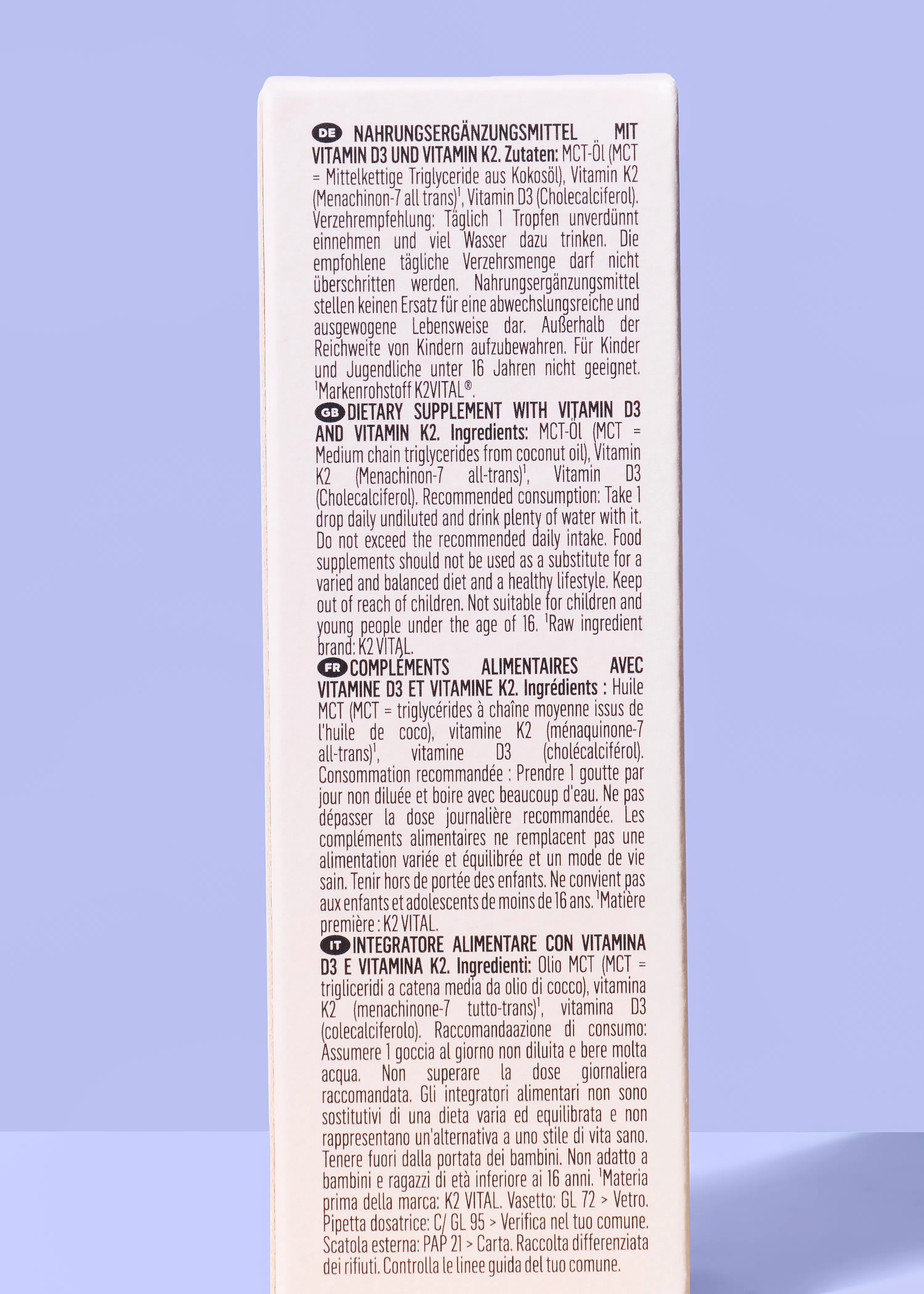 étiquette de complément alimentaire avec des informations sur la vitamine d3 et la vitamine k2, les ingrédients, la posologie et les avertissements en français, allemand, anglais et italien.