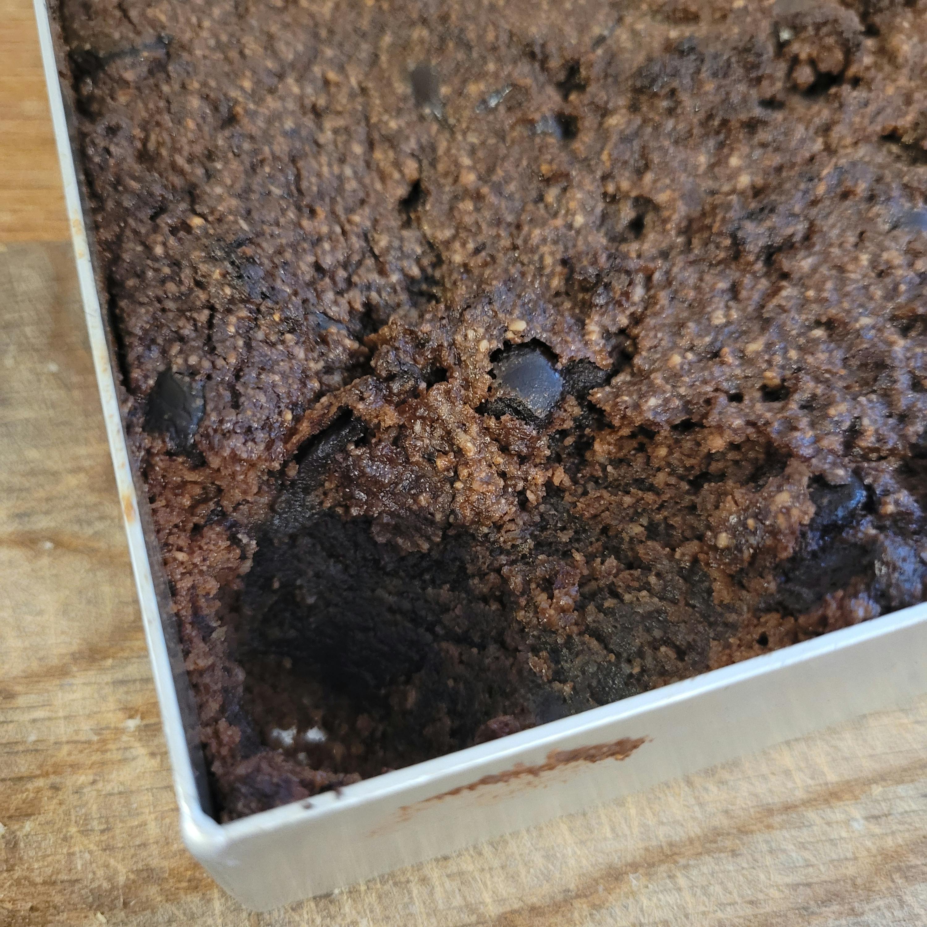 a close up of a brownie with chocolate chips