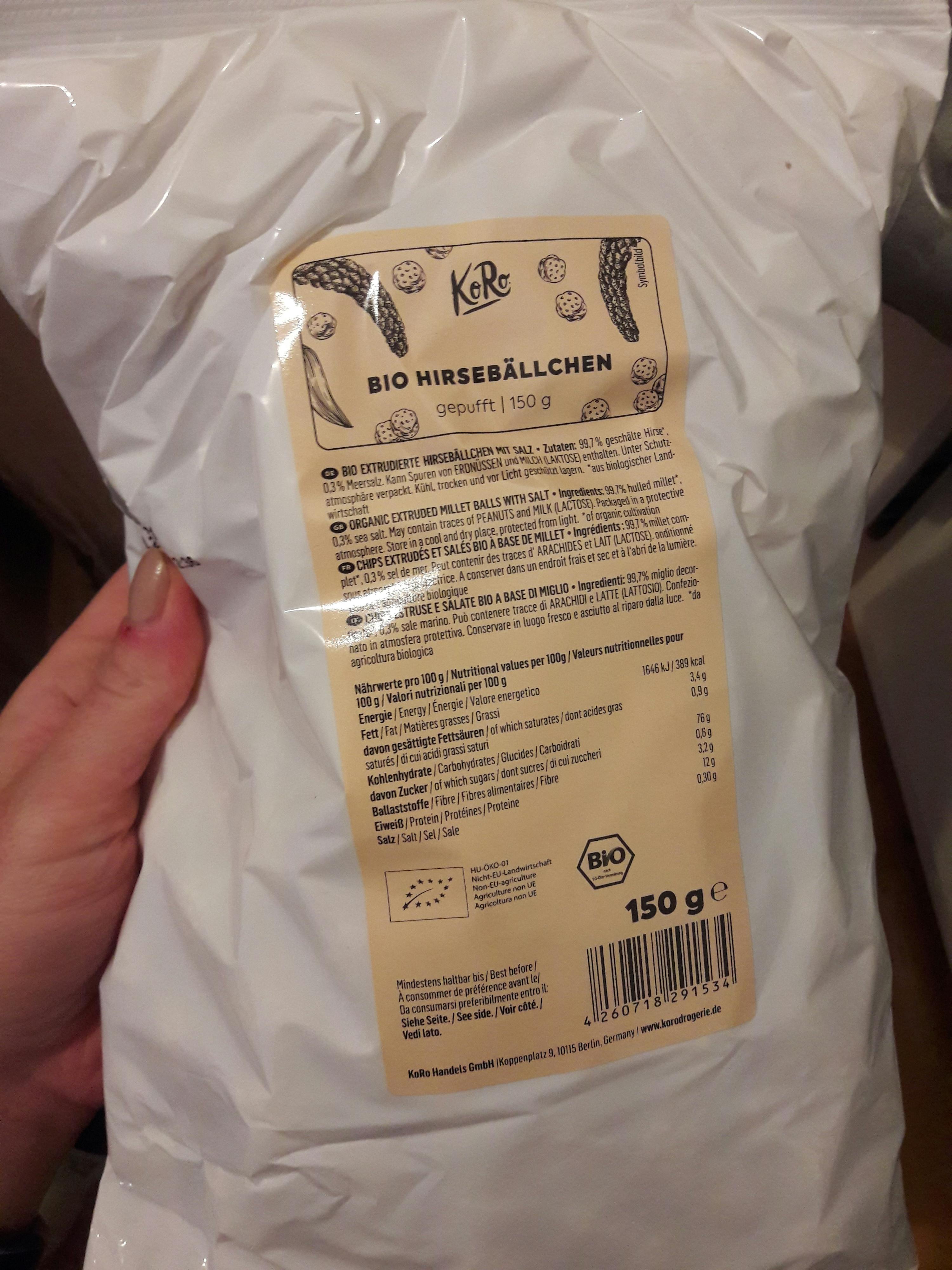 a person is holding a bag of bio hirsebalchen