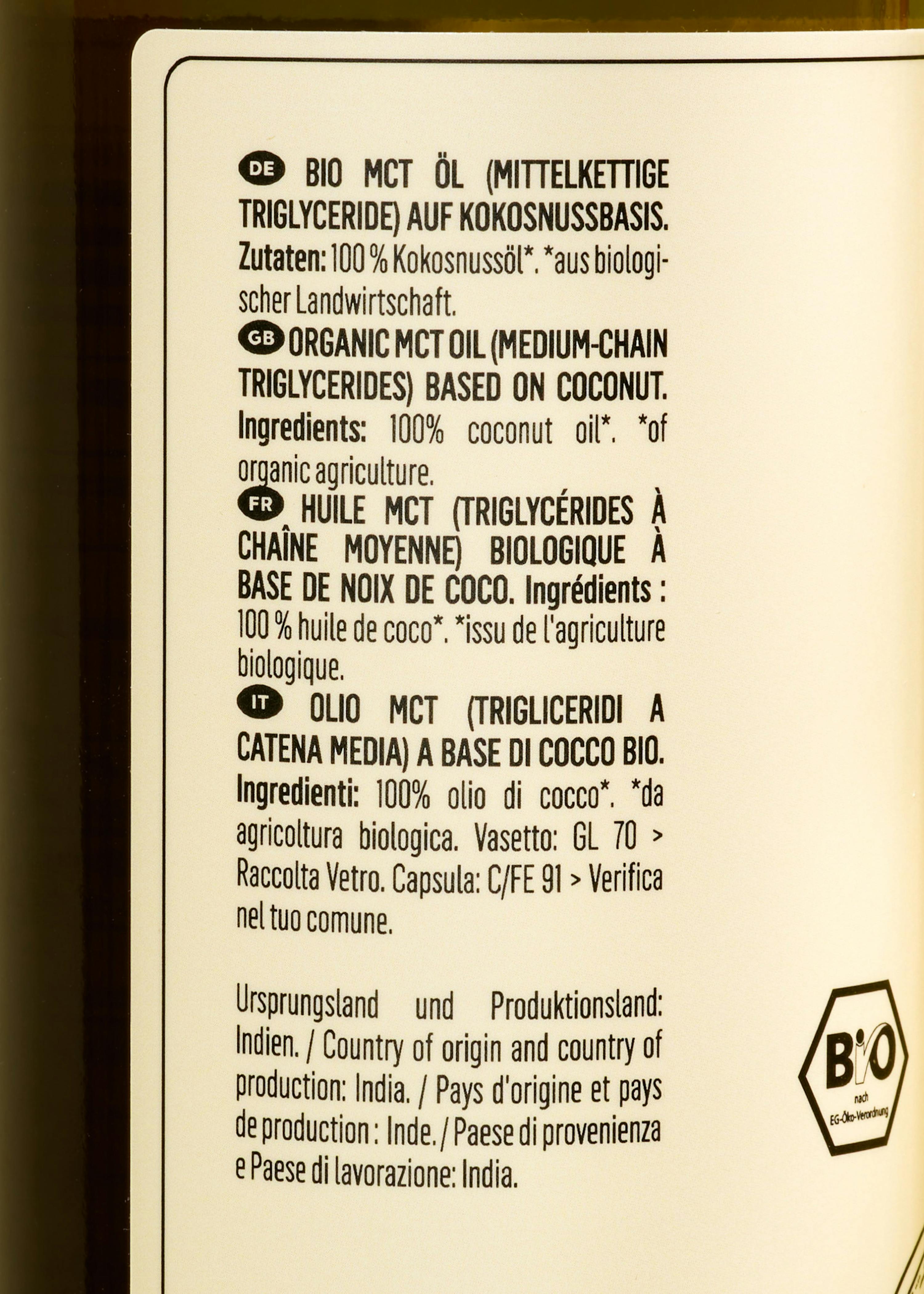 l' arrière d' une bouteille d' huile de noix de coco bio