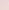a full frame close-up of light pinkish-beige granular powder with tiny reddish-brown specks.