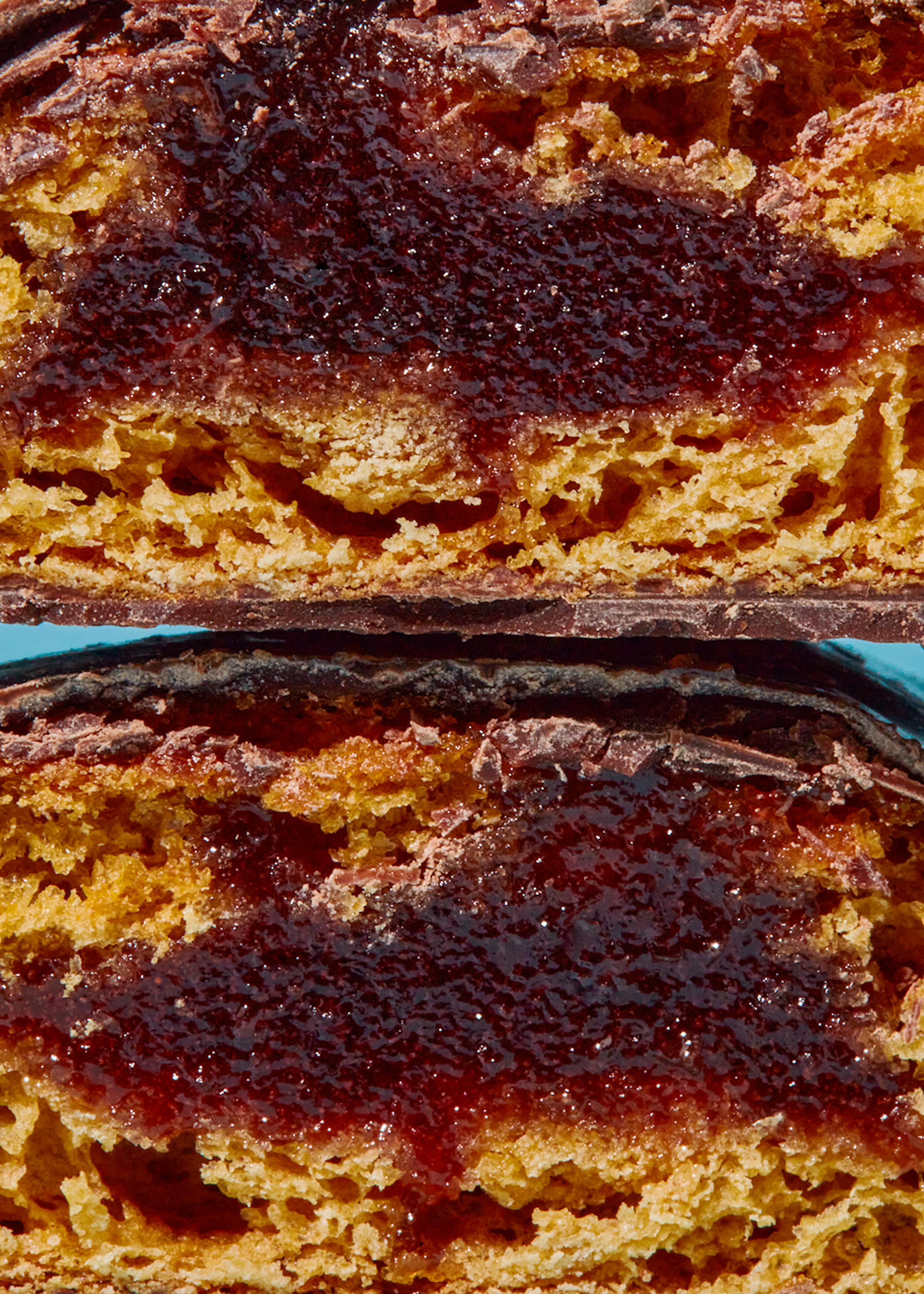 a close up of a piece of food with jelly on it