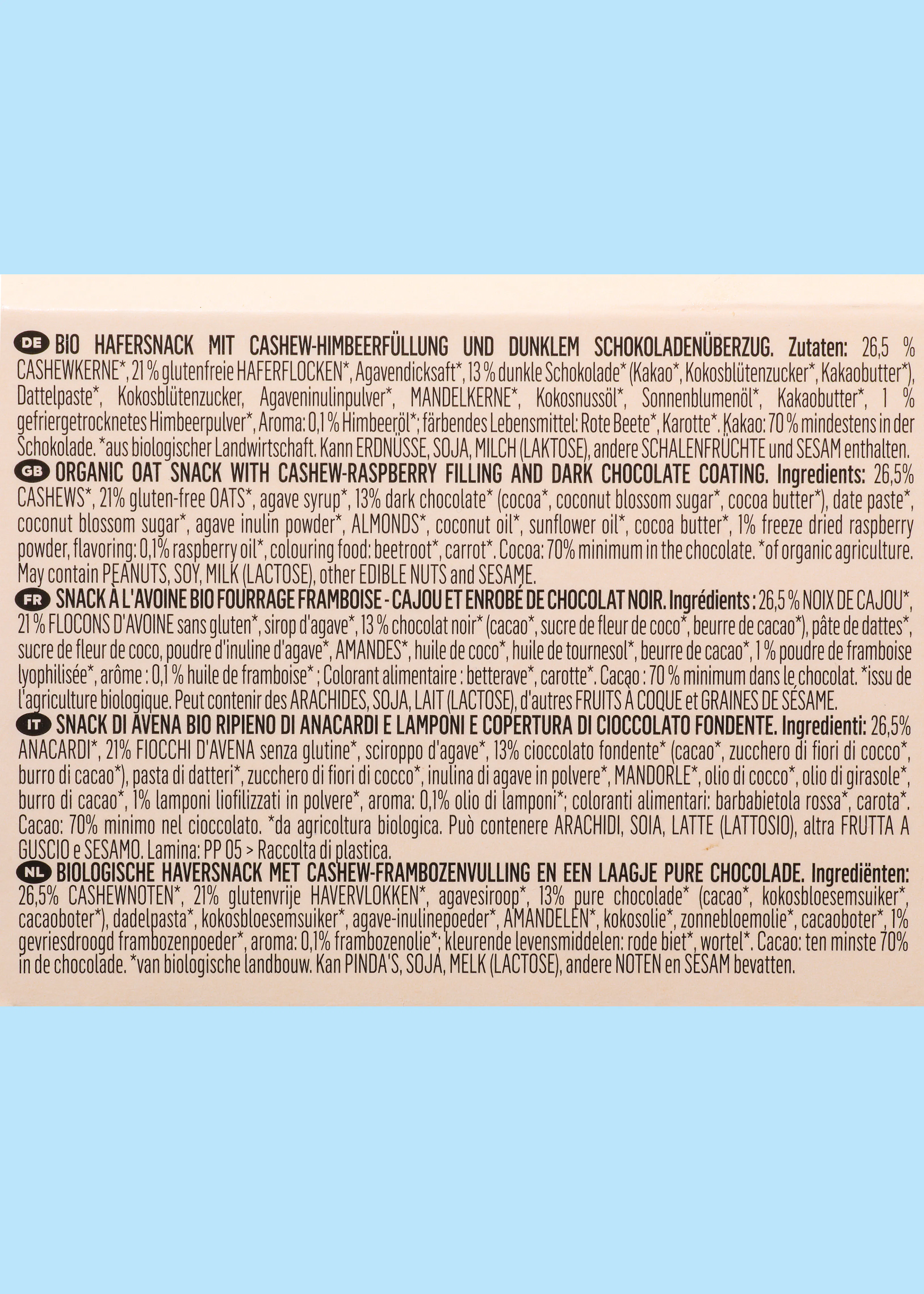 a detailed list of ingredients for an organic oat snack with cashew-raspberry filling and dark chocolate coating, presented in multiple languages on a light blue background.
