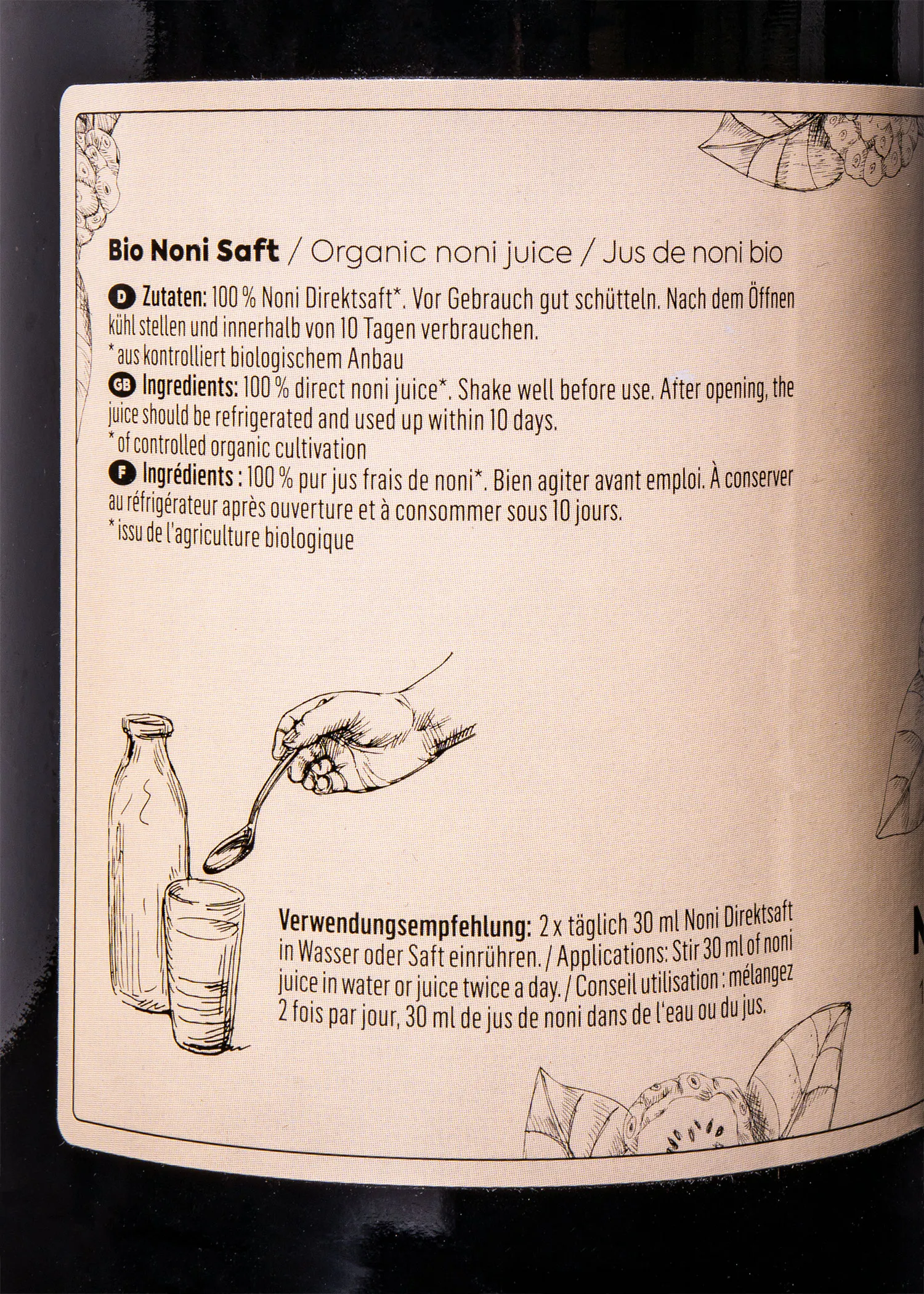 l' arrière d' une bouteille de jus noni bio