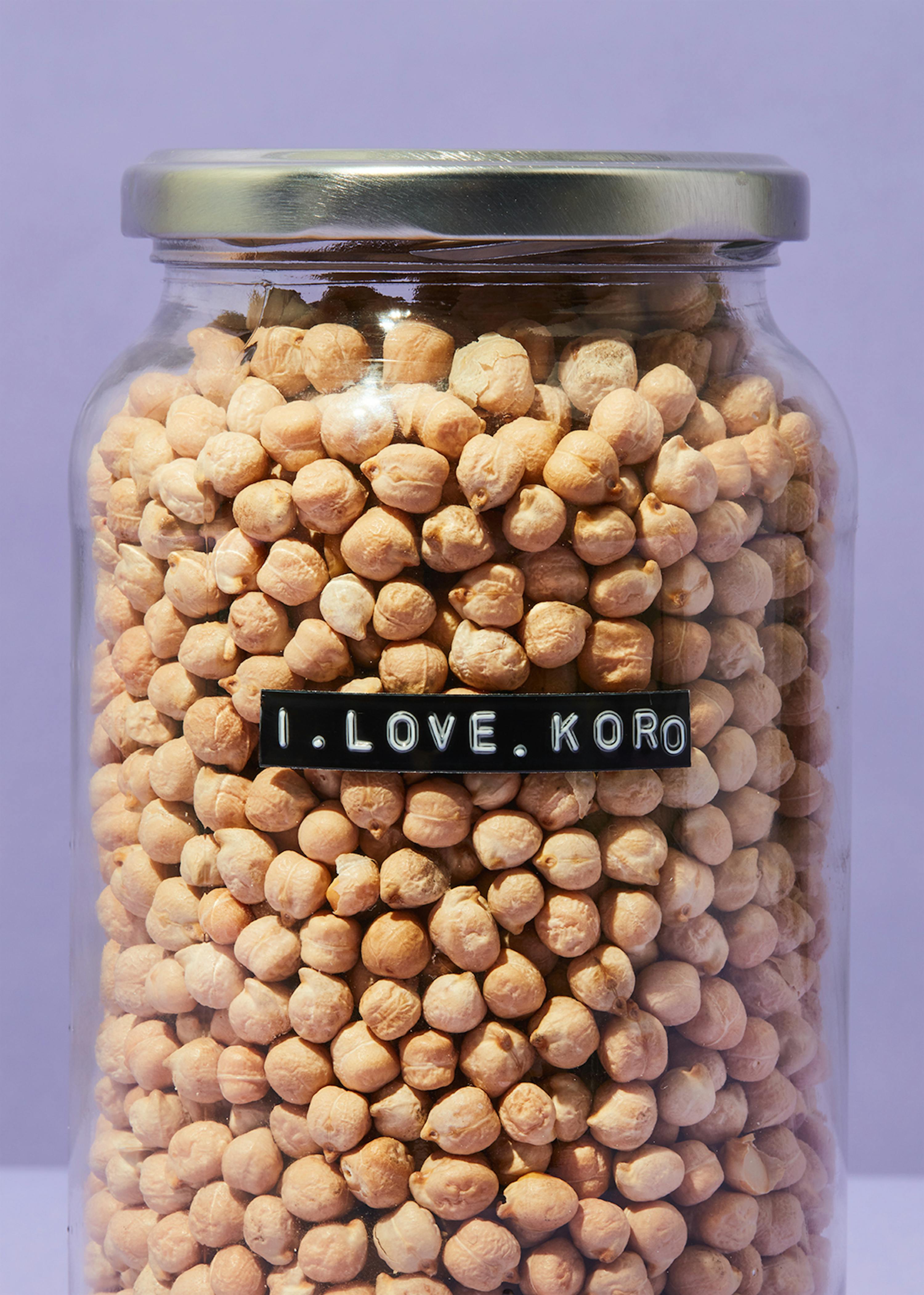 a jar of chickpeas has a label that says i love koro