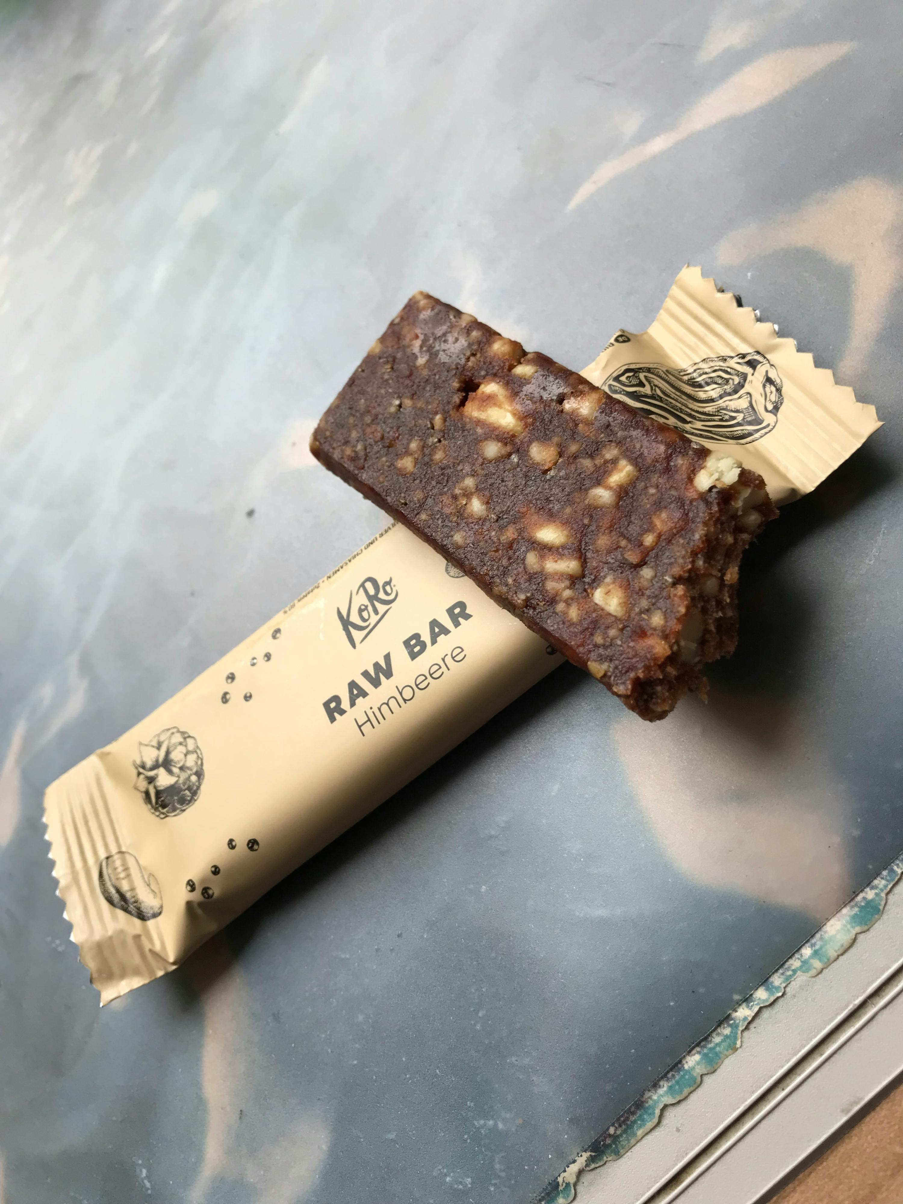 a close up of a raw bar with a bite taken out of it