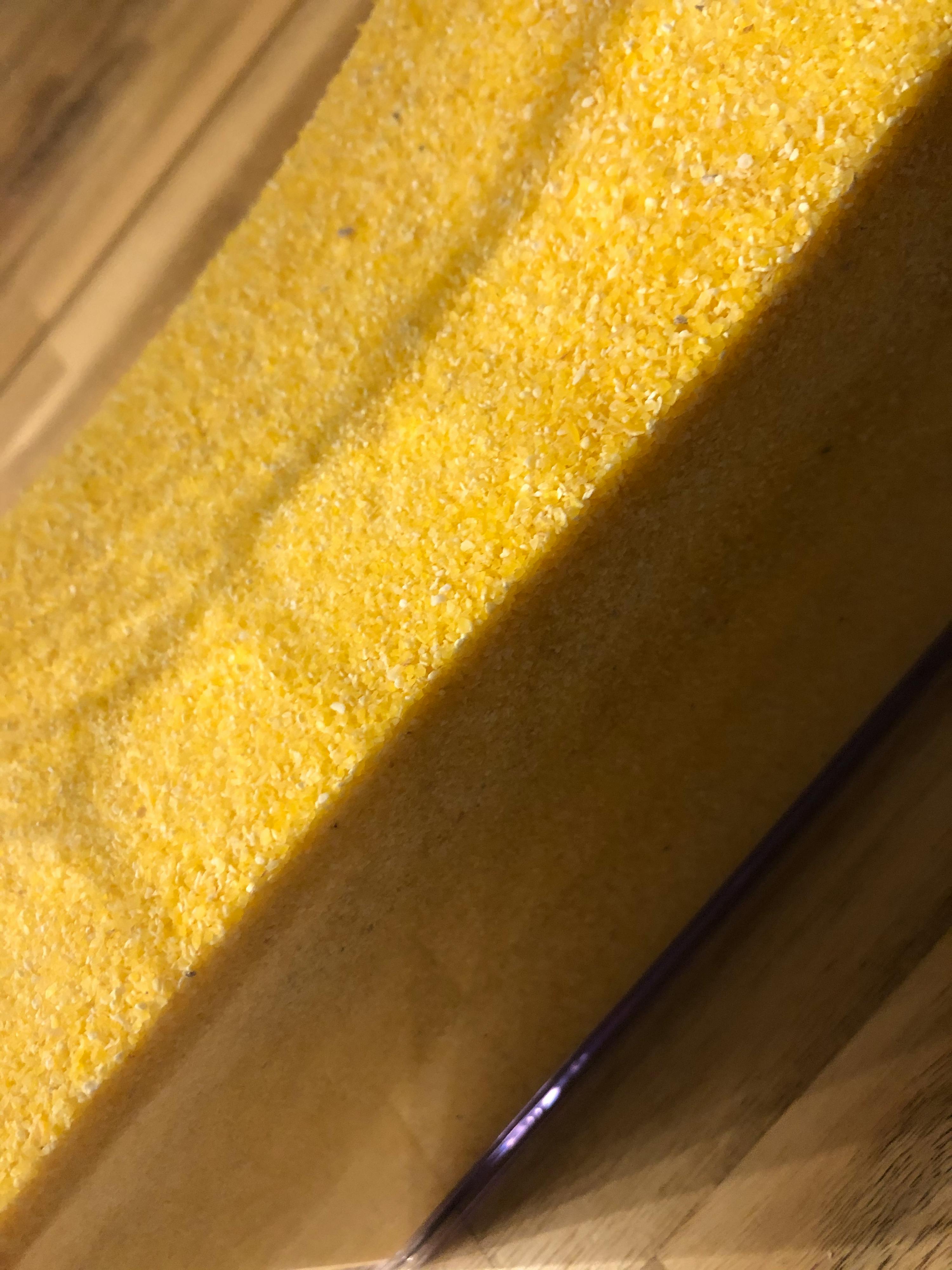 a close up of a piece of yellow foam