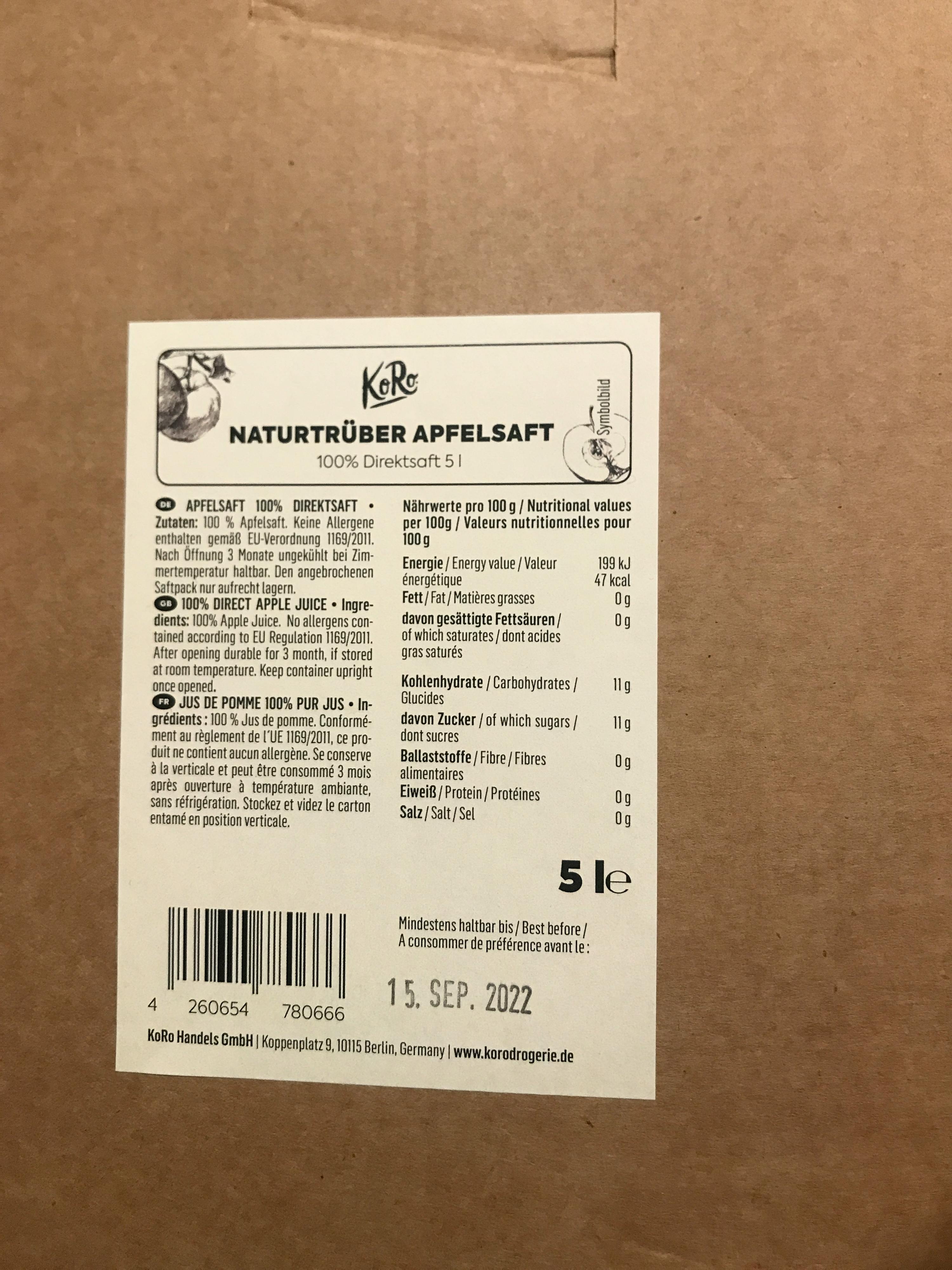 l' arrière d' une boîte en carton avec une étiquette blanche qui indique naturtrubber apfelsaft