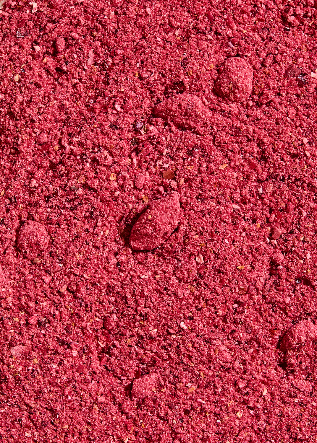 un gros plan d' un tas de pierres roses