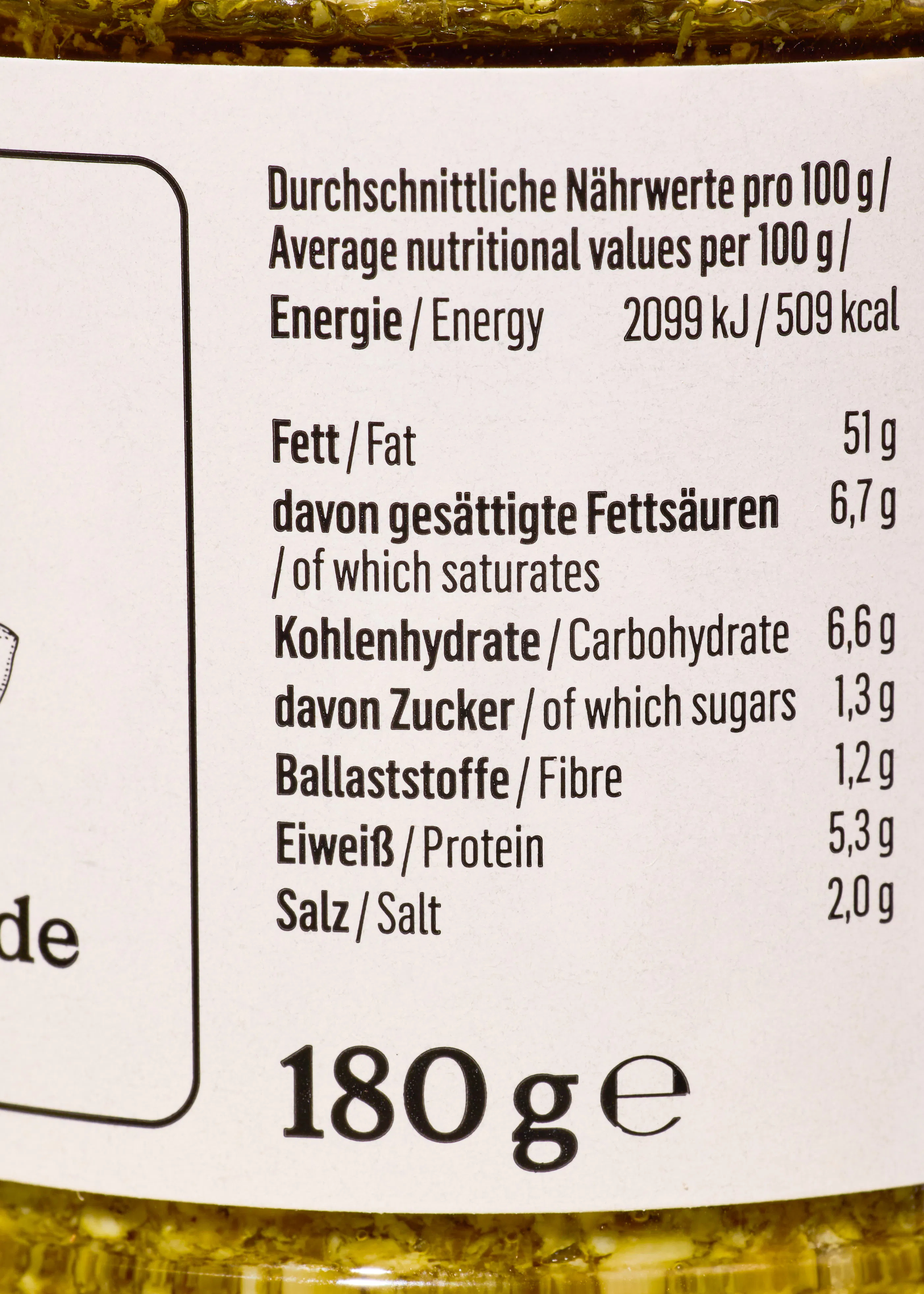 étiquette nutritionnelle détaillée indiquant les valeurs moyennes pour 100g de produit, telles que l'énergie, les graisses, les glucides, les protéines et le sel, ainsi que le poids net de 180g.