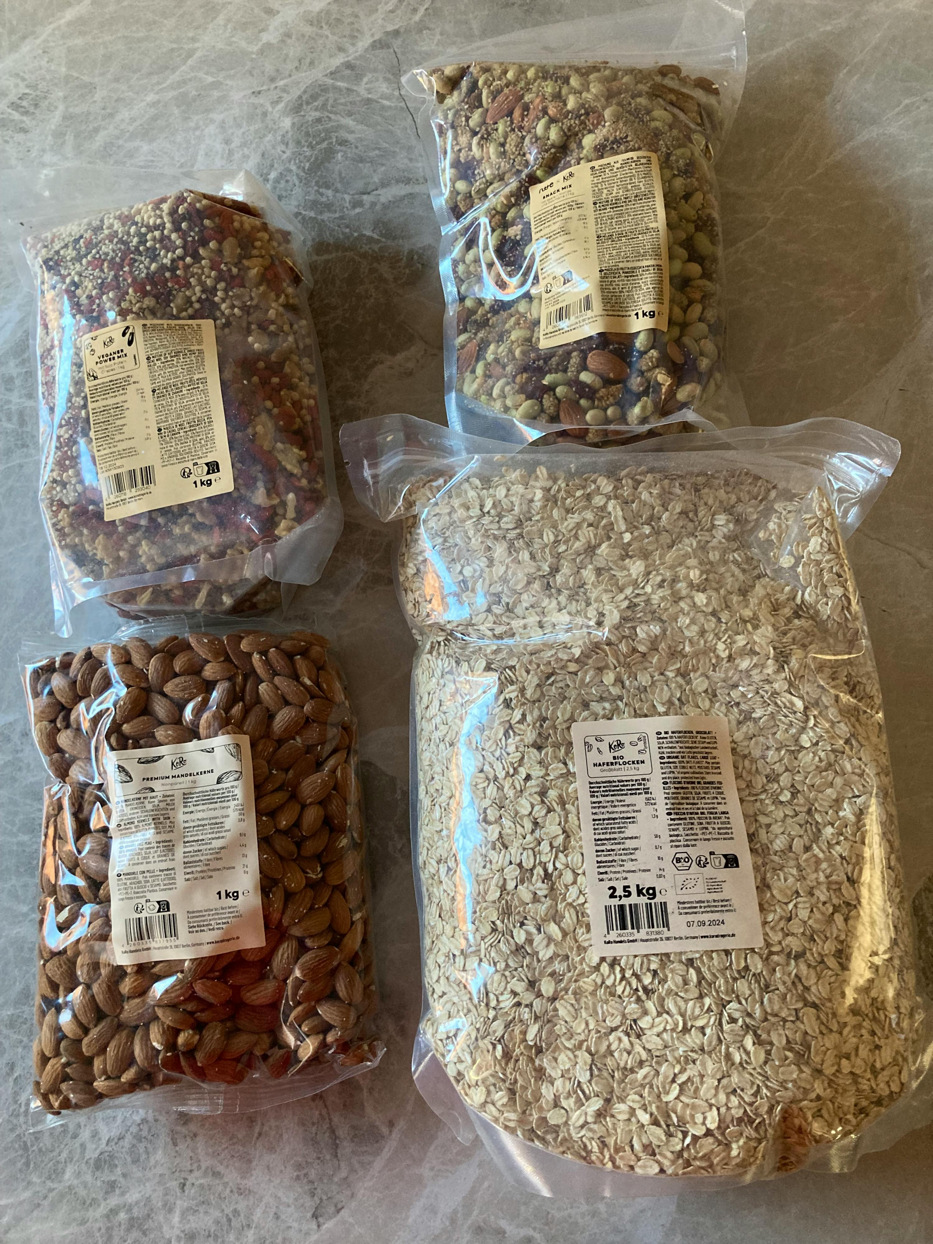 a bag of oats sits next to a bag of almonds