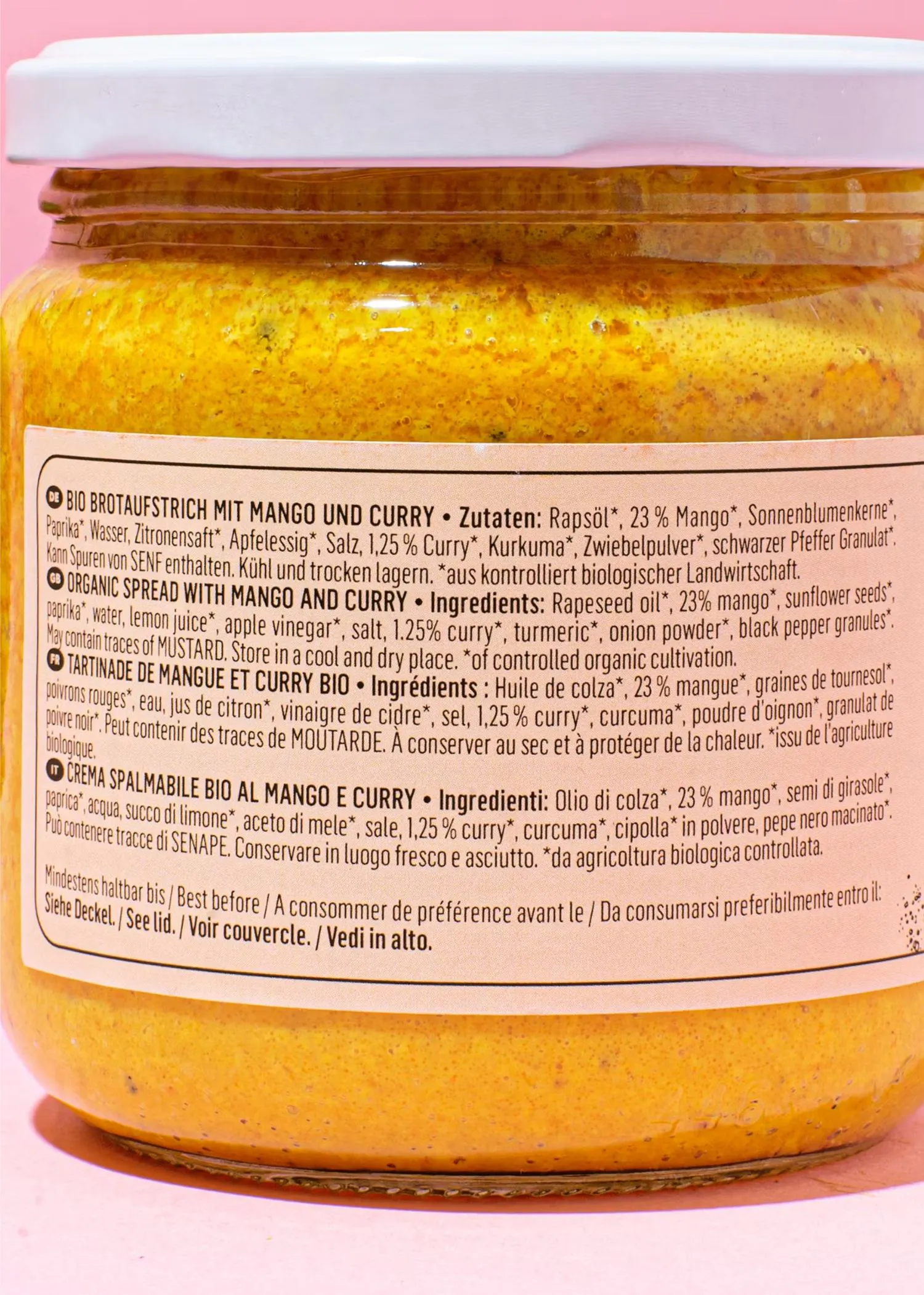 the back of a jar of curry spread with mango and curry