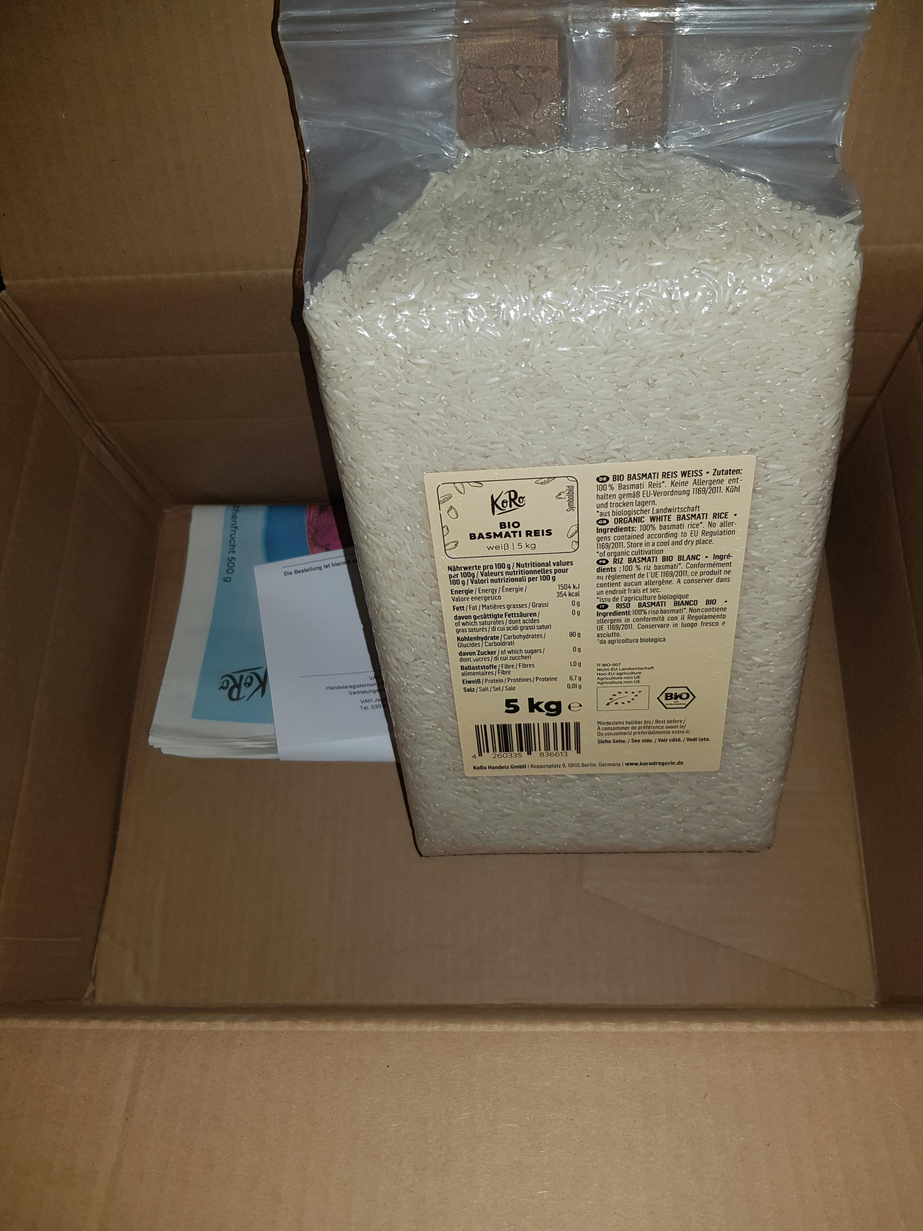 a 5 kg bag of rice is in a cardboard box