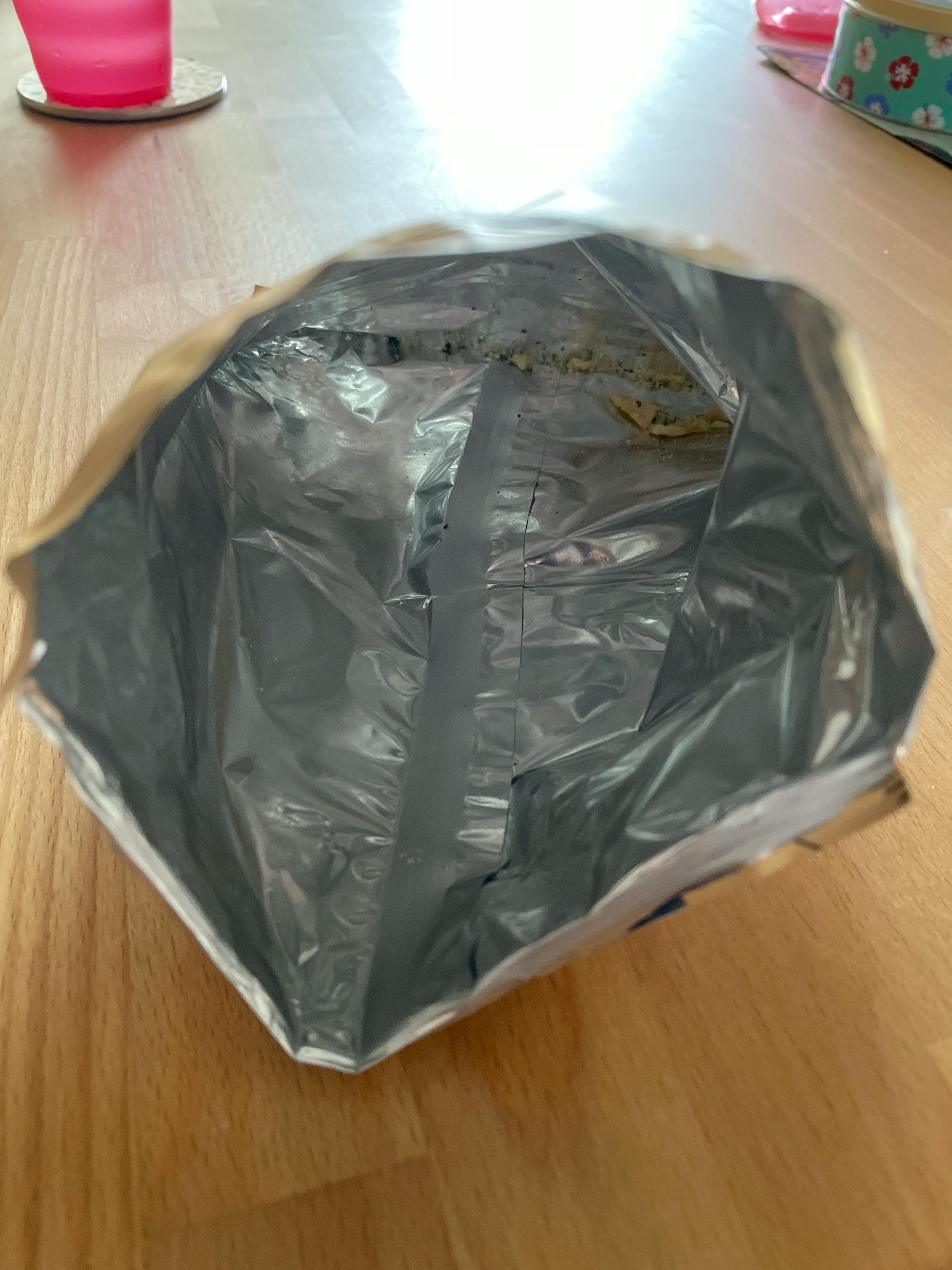 the inside of a plastic bag with a foil lining