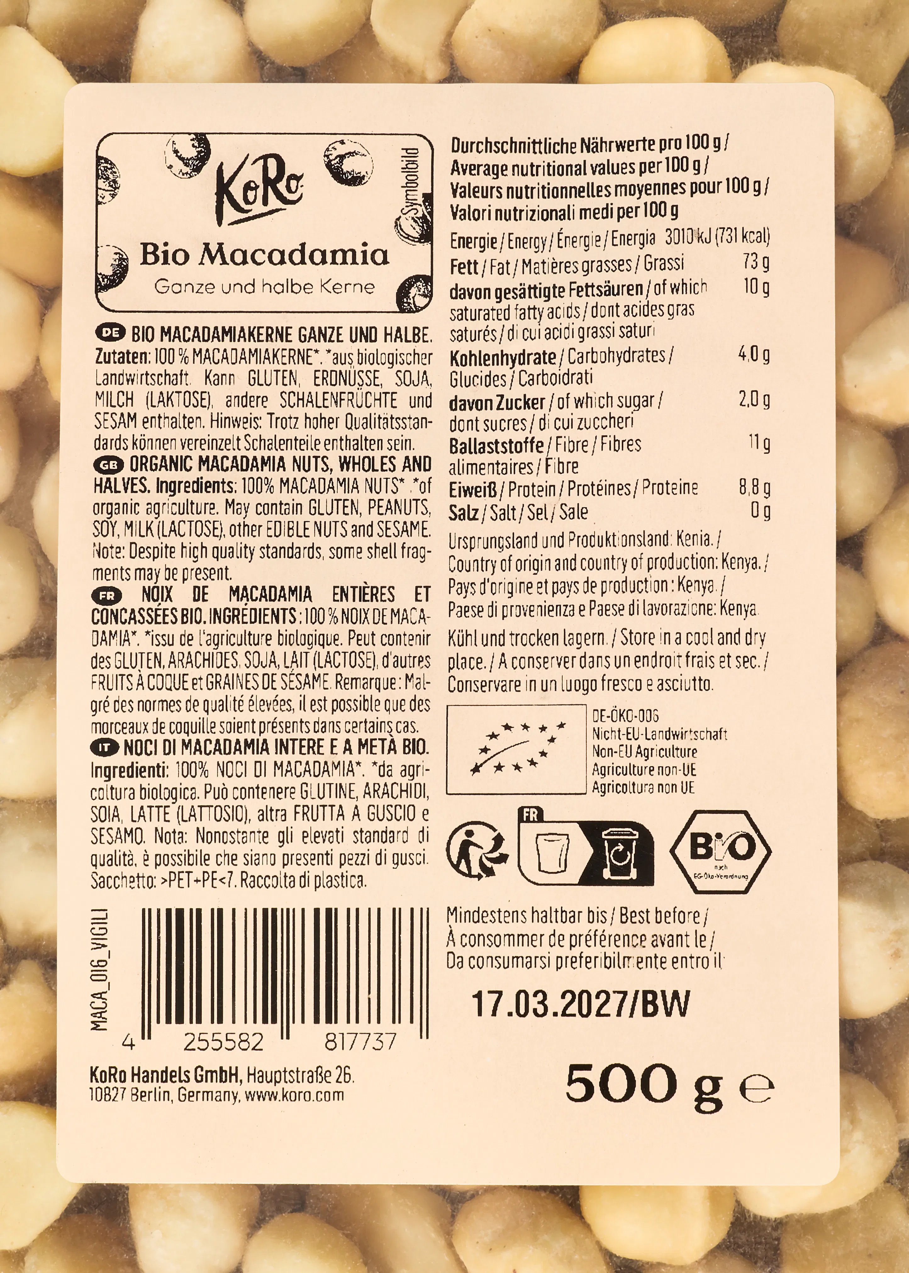 etikett für koro bio macadamia ganze und halbe kerne mit nährwertangaben, zutatenliste, bio-zertifizierungen und einem haltbarkeitsdatum von 17.03.2027.