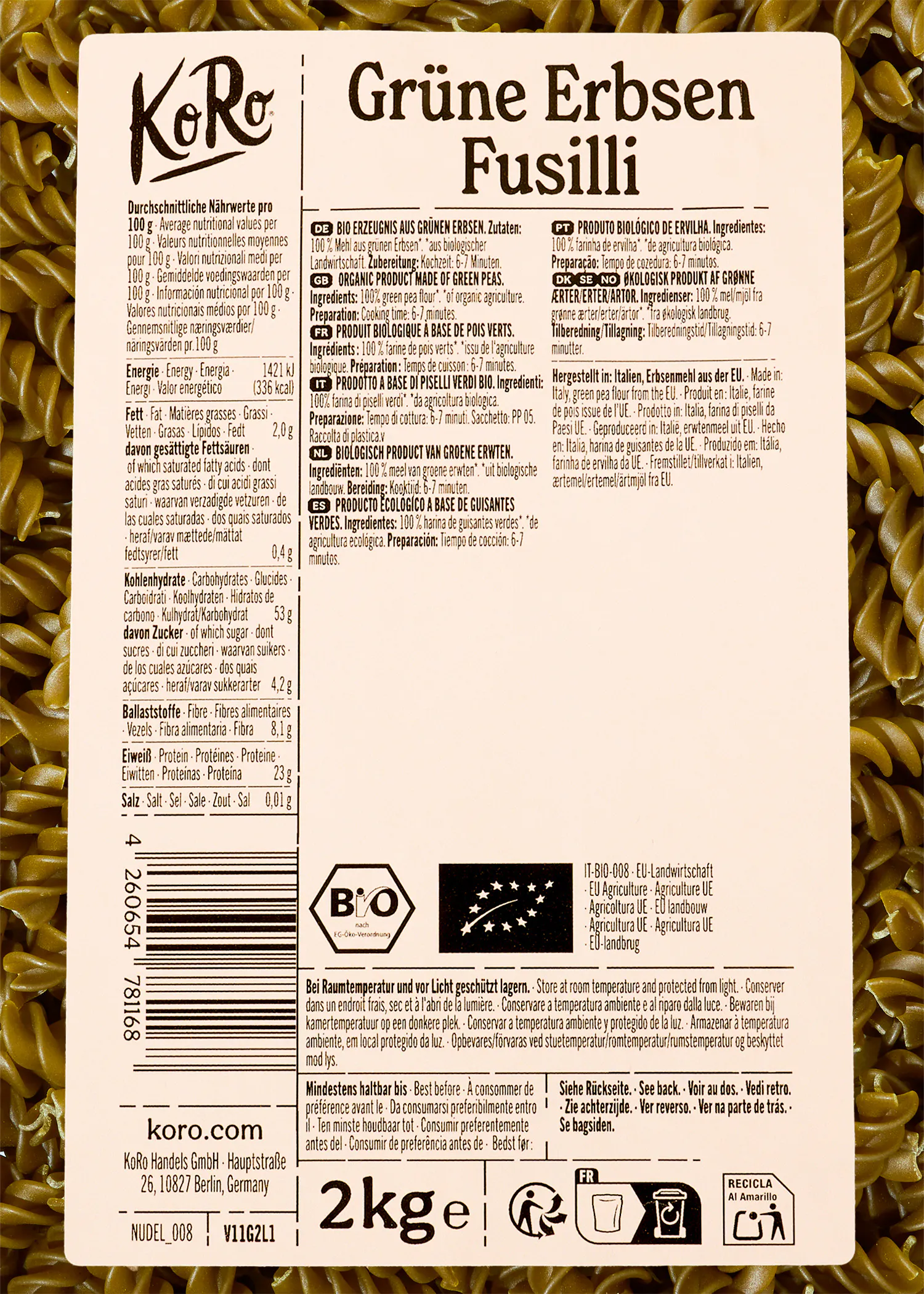 the back label of a koro brand green pea fusilli pasta package showing nutritional information, ingredients, and storage instructions.