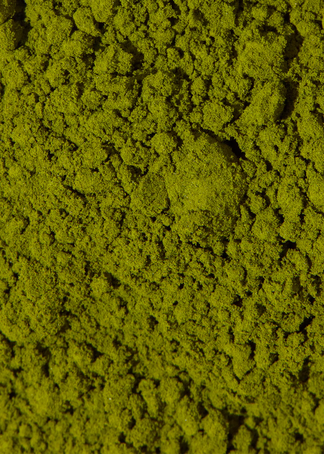 un gros plan d' un tas de poudre jaune