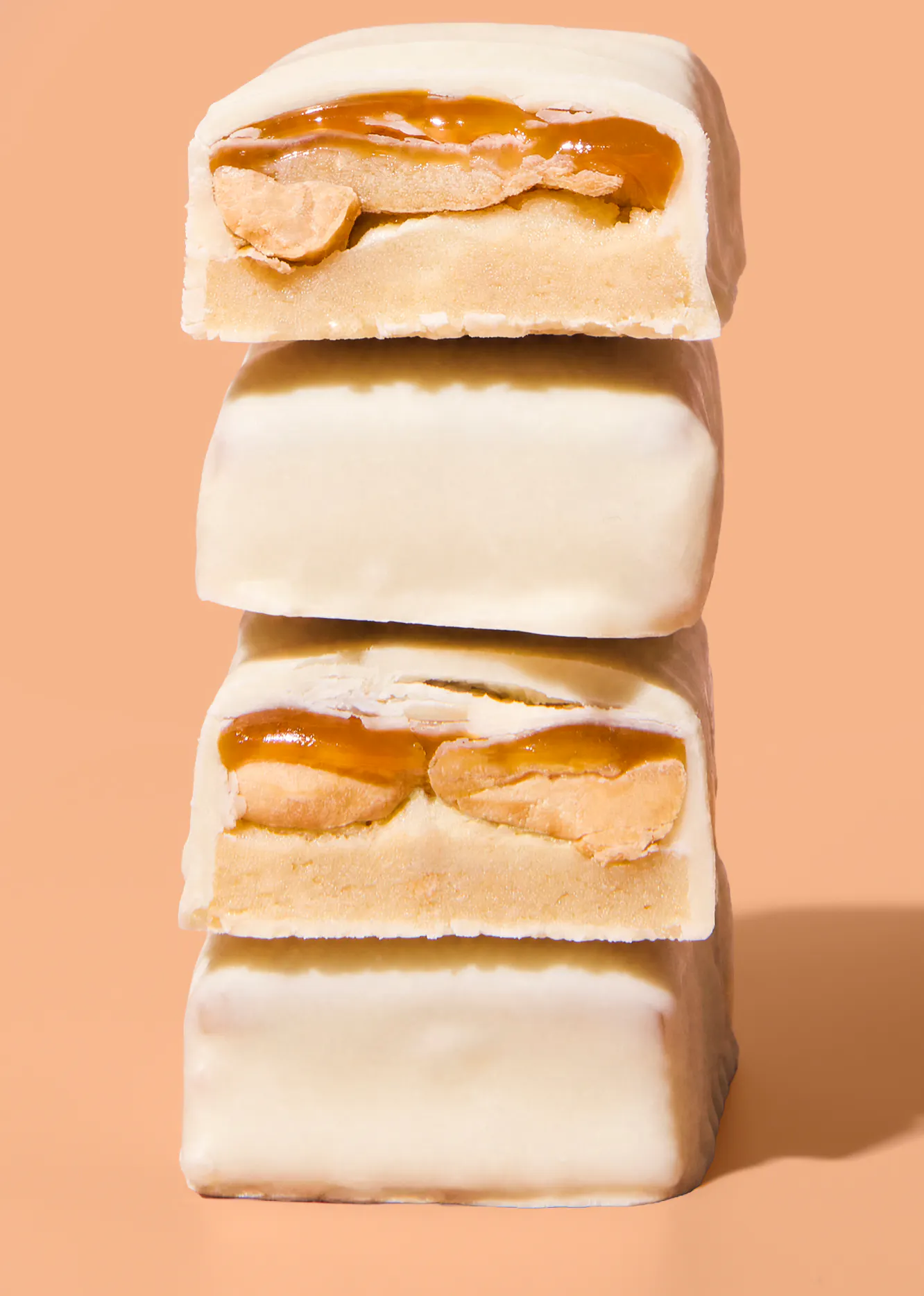 Barre protéinée moelleuse aux cacahuètes et chocolat blanc | 45 g hover
