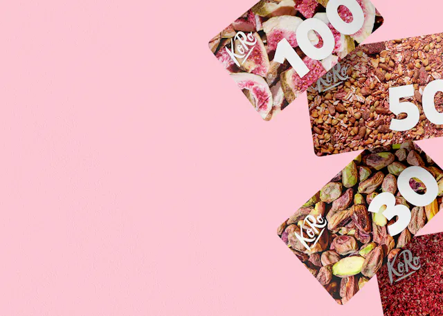 a stack of gift cards with the numbers 100 50 and 30 on them