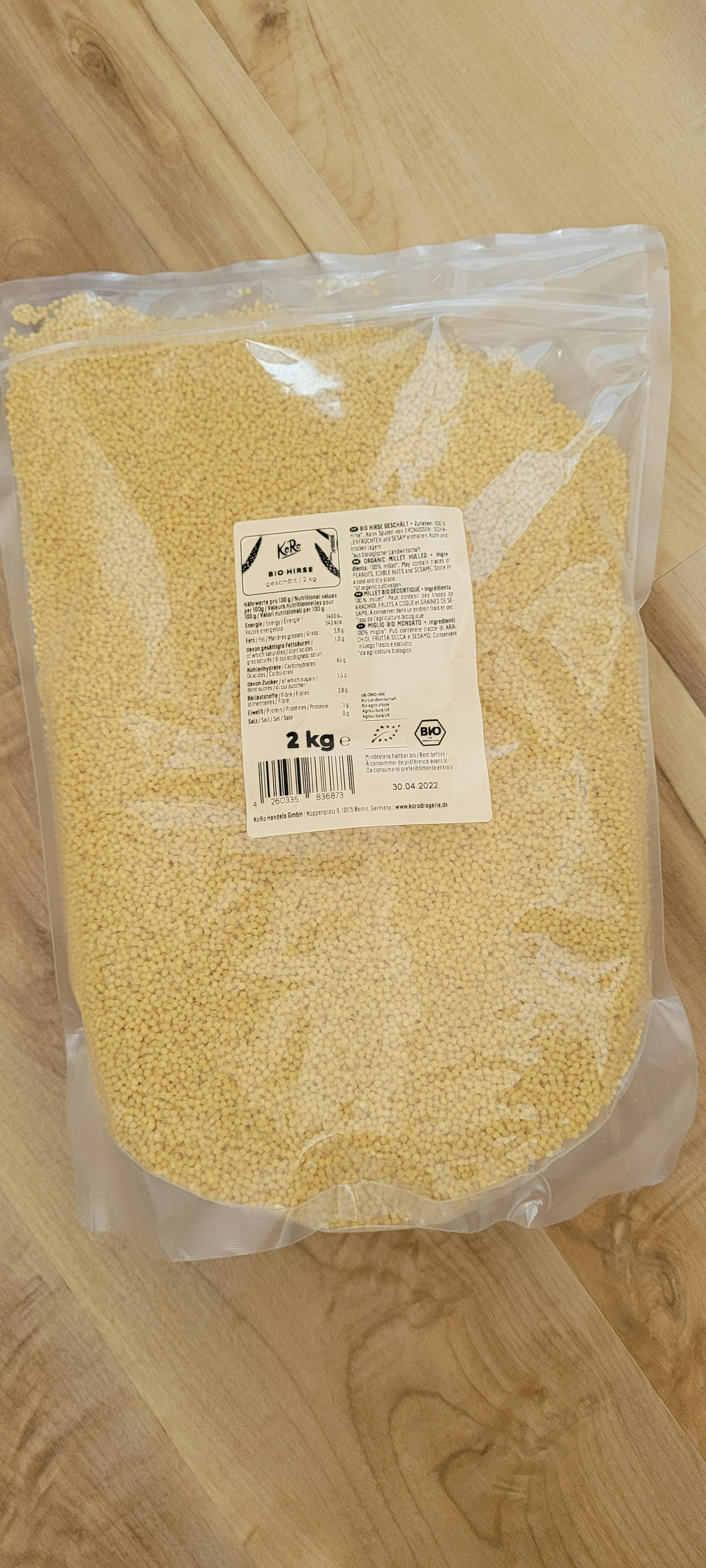 a bag of couscous sits on a wooden table