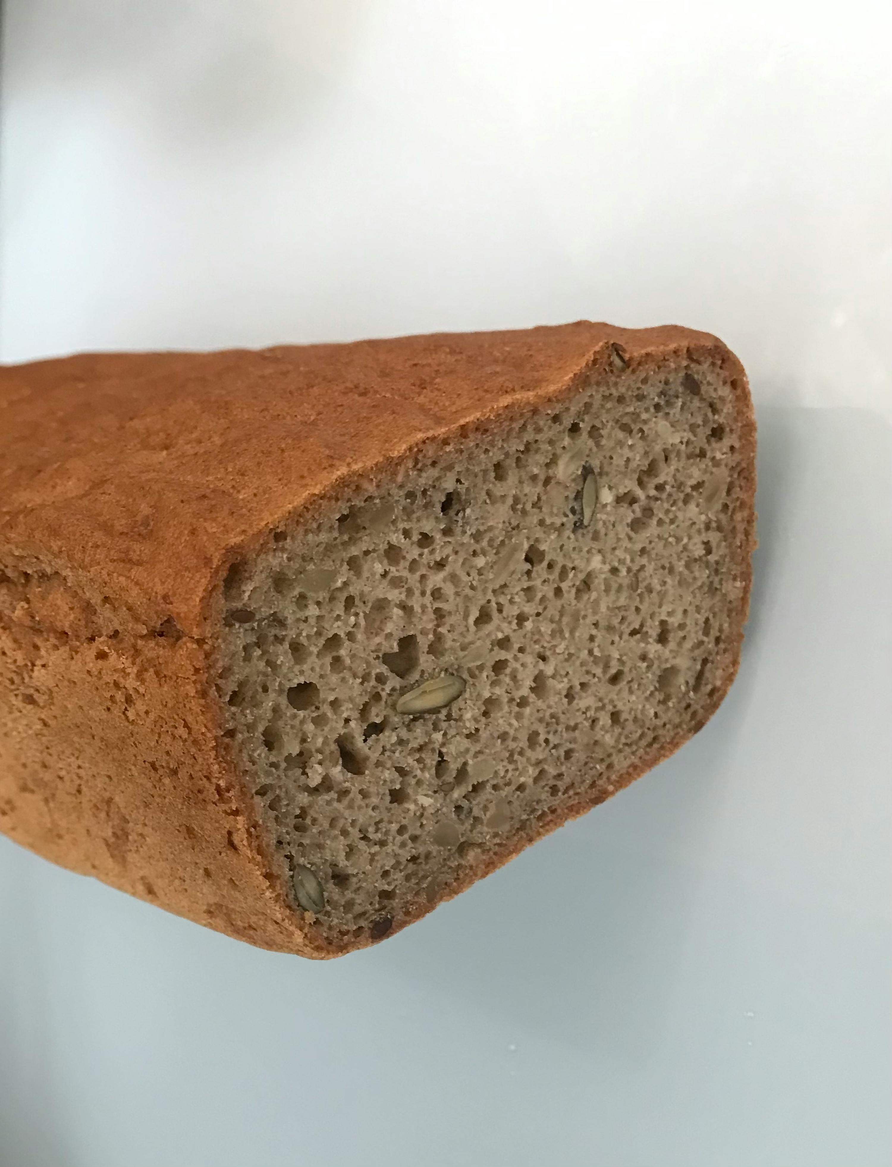 a loaf of bread has a few seeds in it