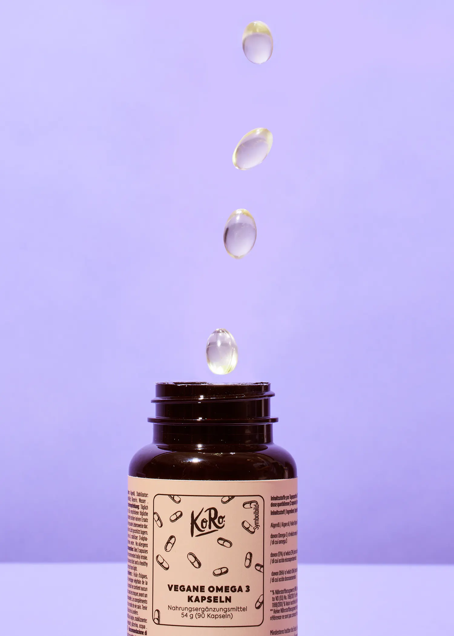 eine braune Flasche mit der Aufschrift " vegane omega 3 kapseln "