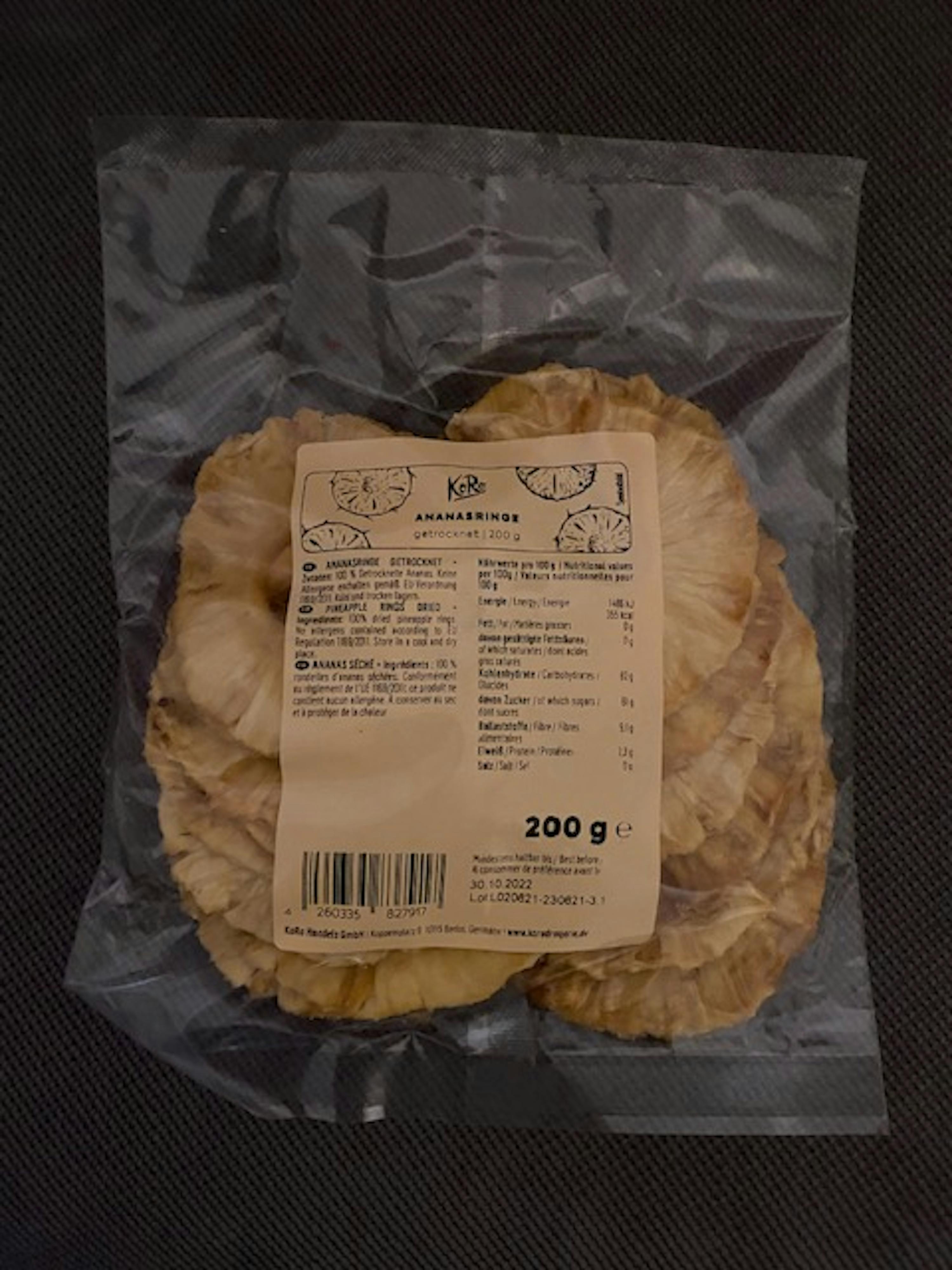 a bag of dried pineapple slices with a label on the back