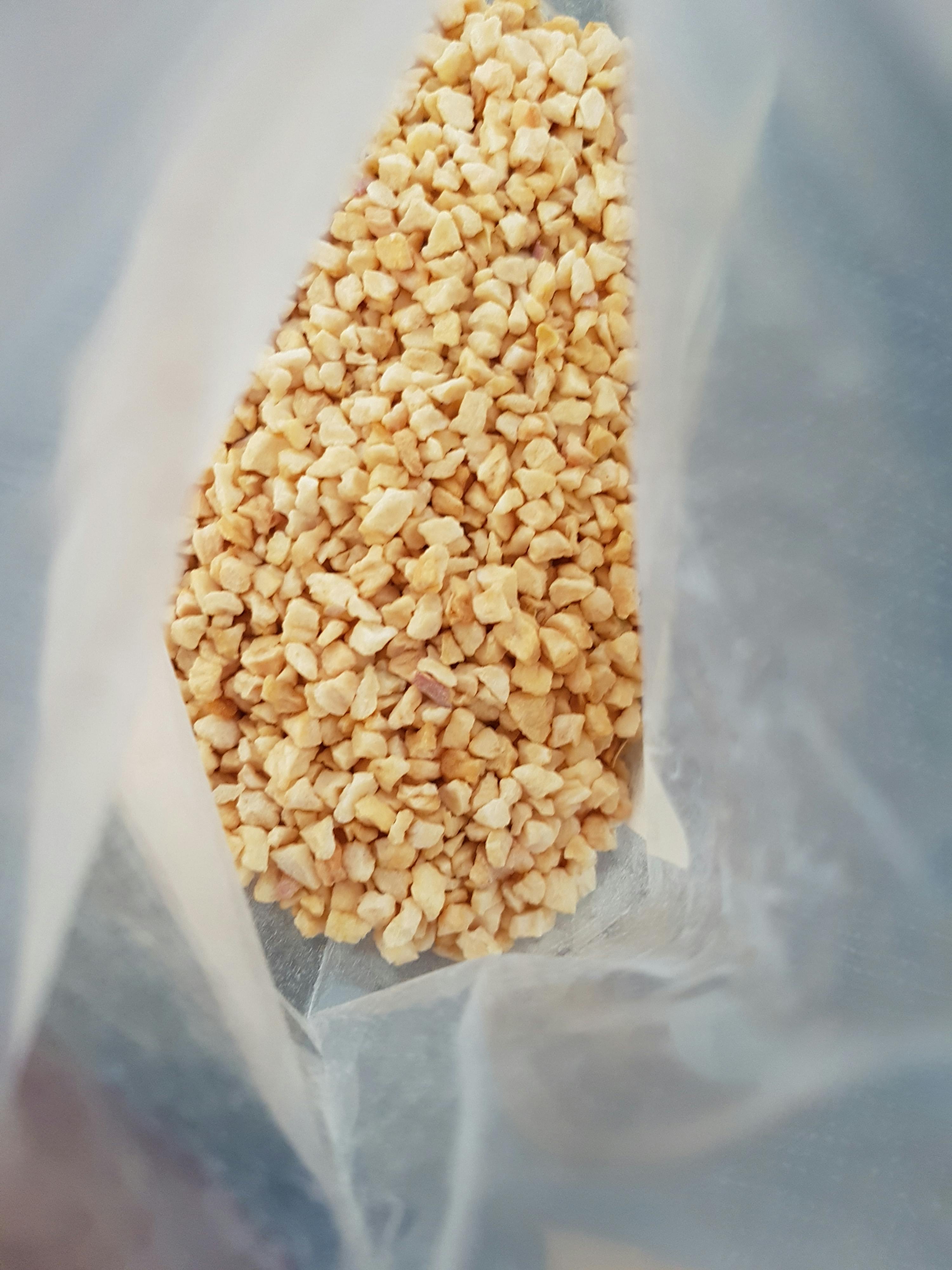 a plastic bag filled with small pieces of food