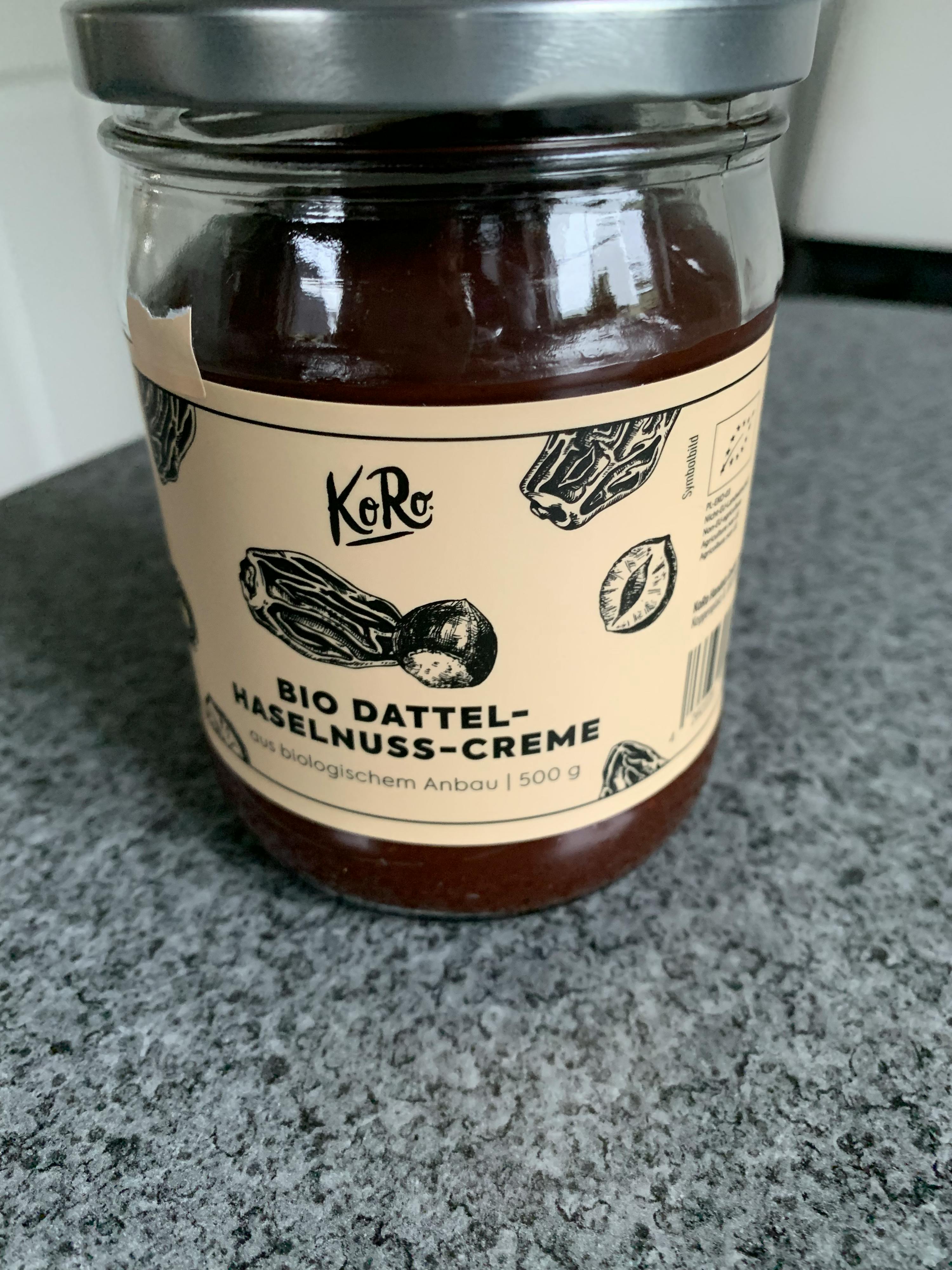 a jar of bio dattel haselnusscreme sitting on a counter