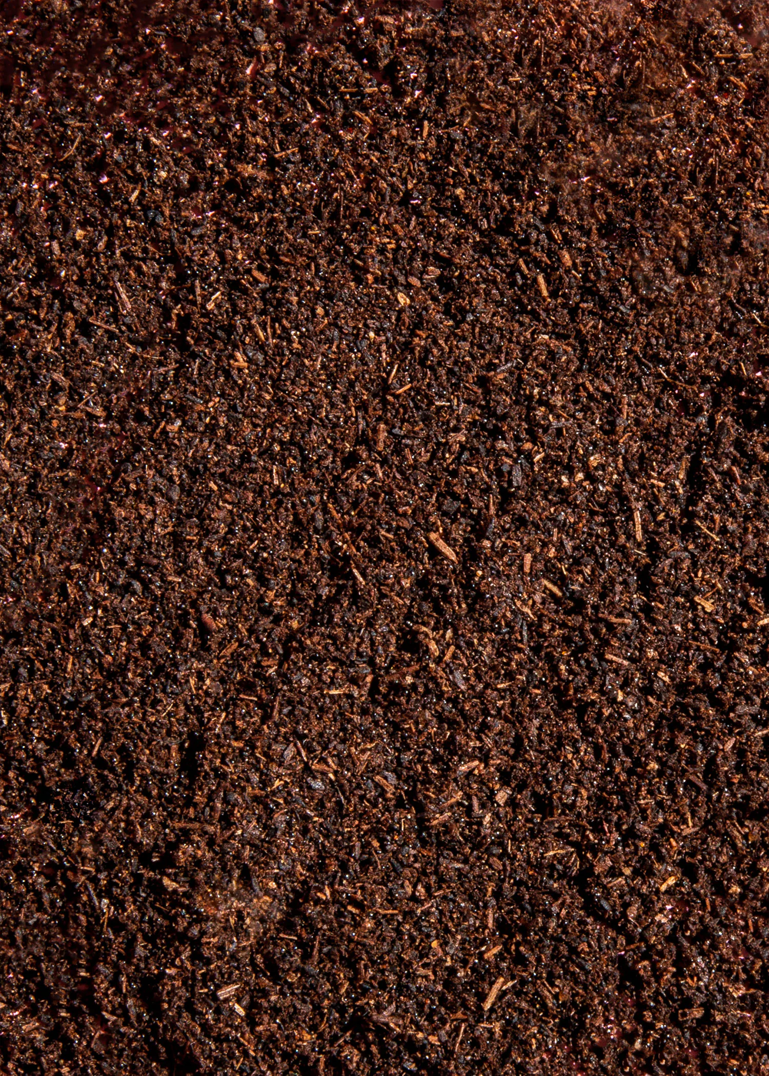 a close up of a pile of brown soil