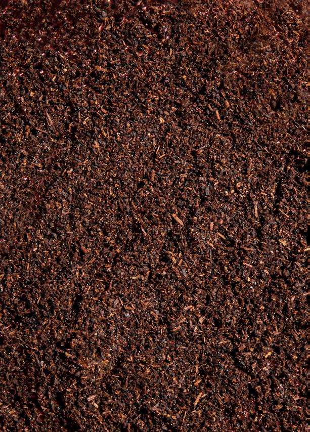 a close up of a pile of brown soil
