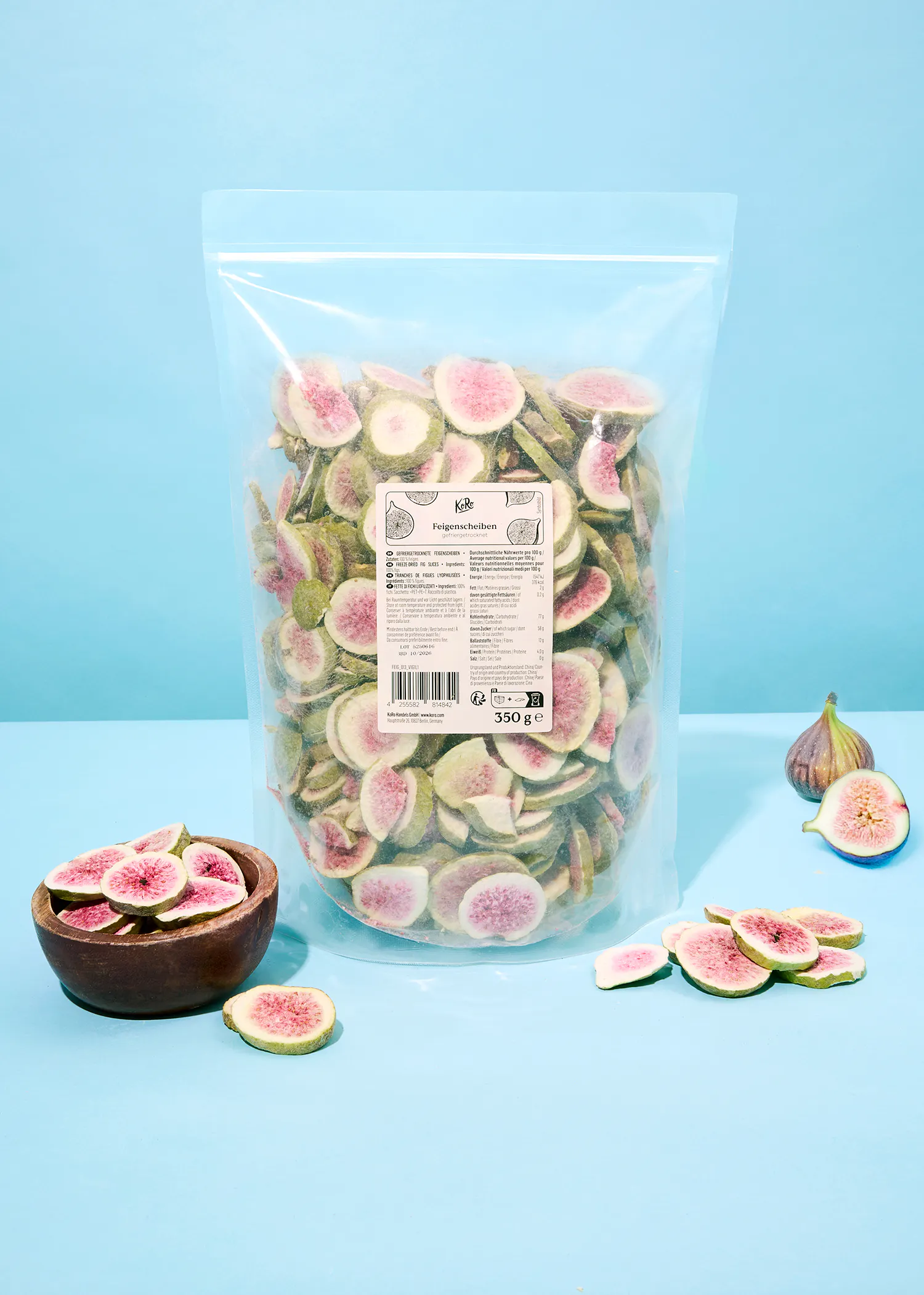 a bag of sliced figs sits on a blue surface