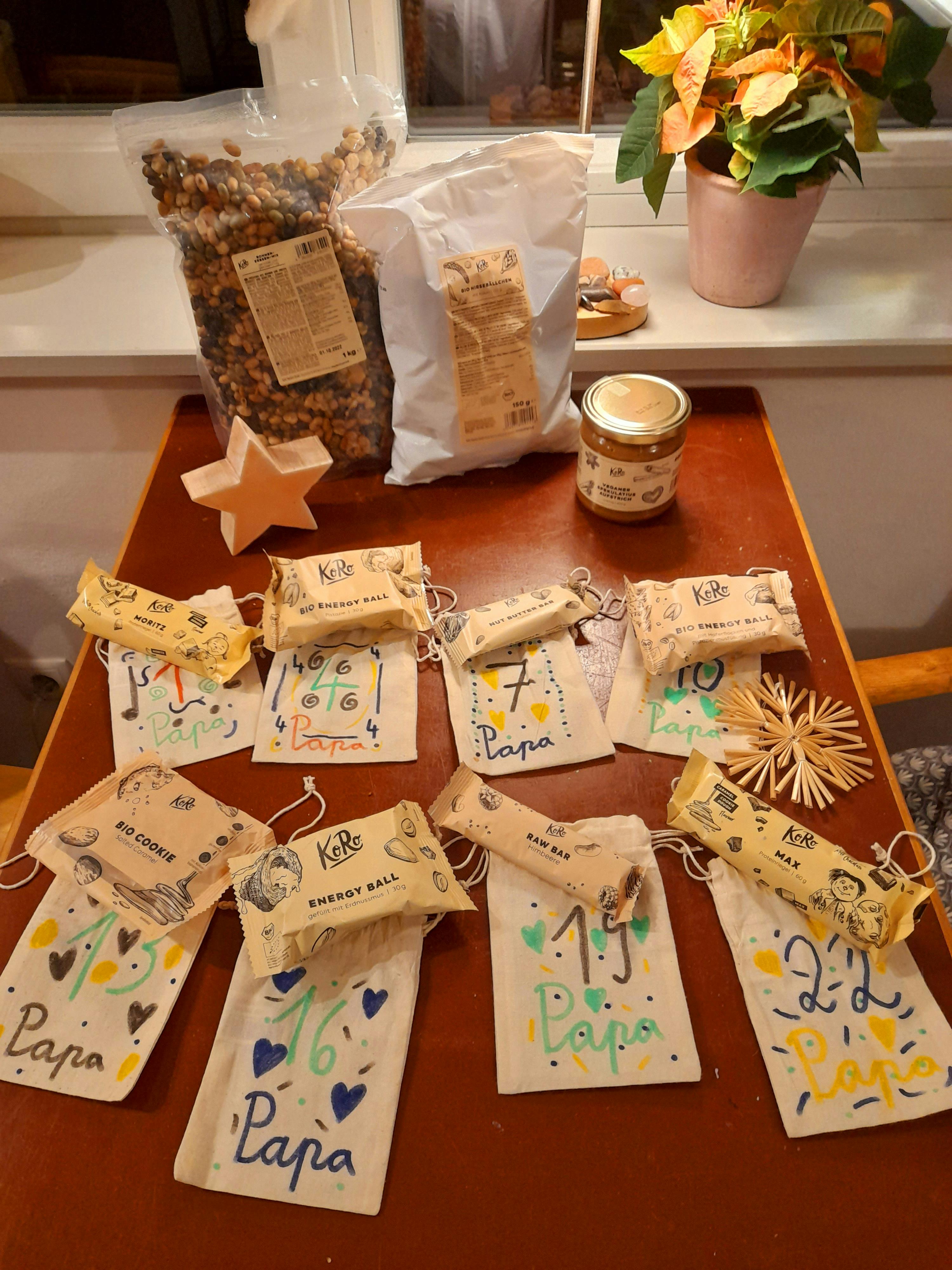 a table with a variety of snacks including energy balls