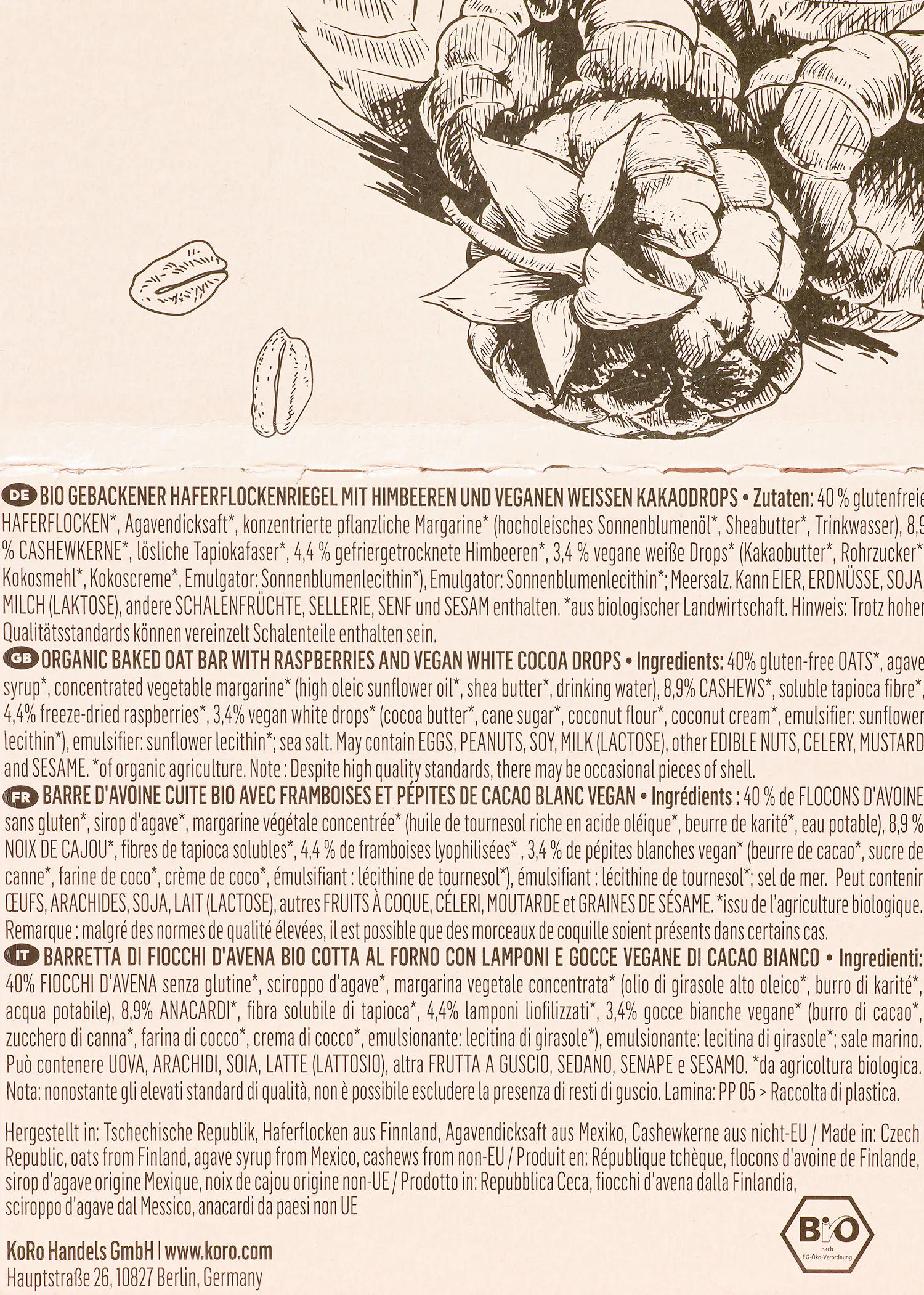 die rückseite einer bio gebackenen haferflockenriegel mit himbeeren und veganen weissen kakaodrops