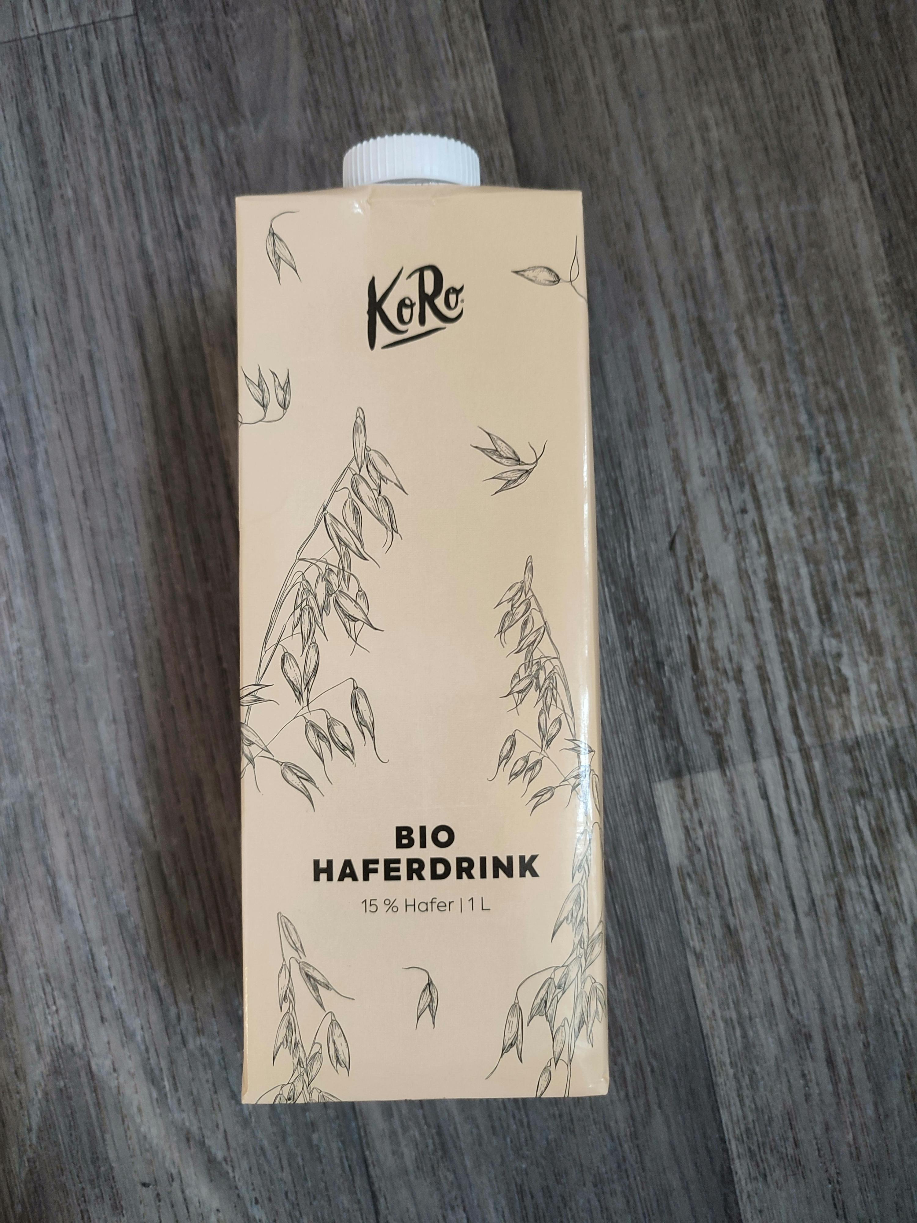 a carton of bio haferdrink sits on a wooden surface