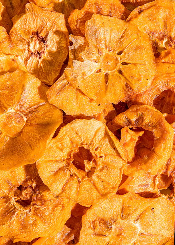 a close up of a pile of dried fruit