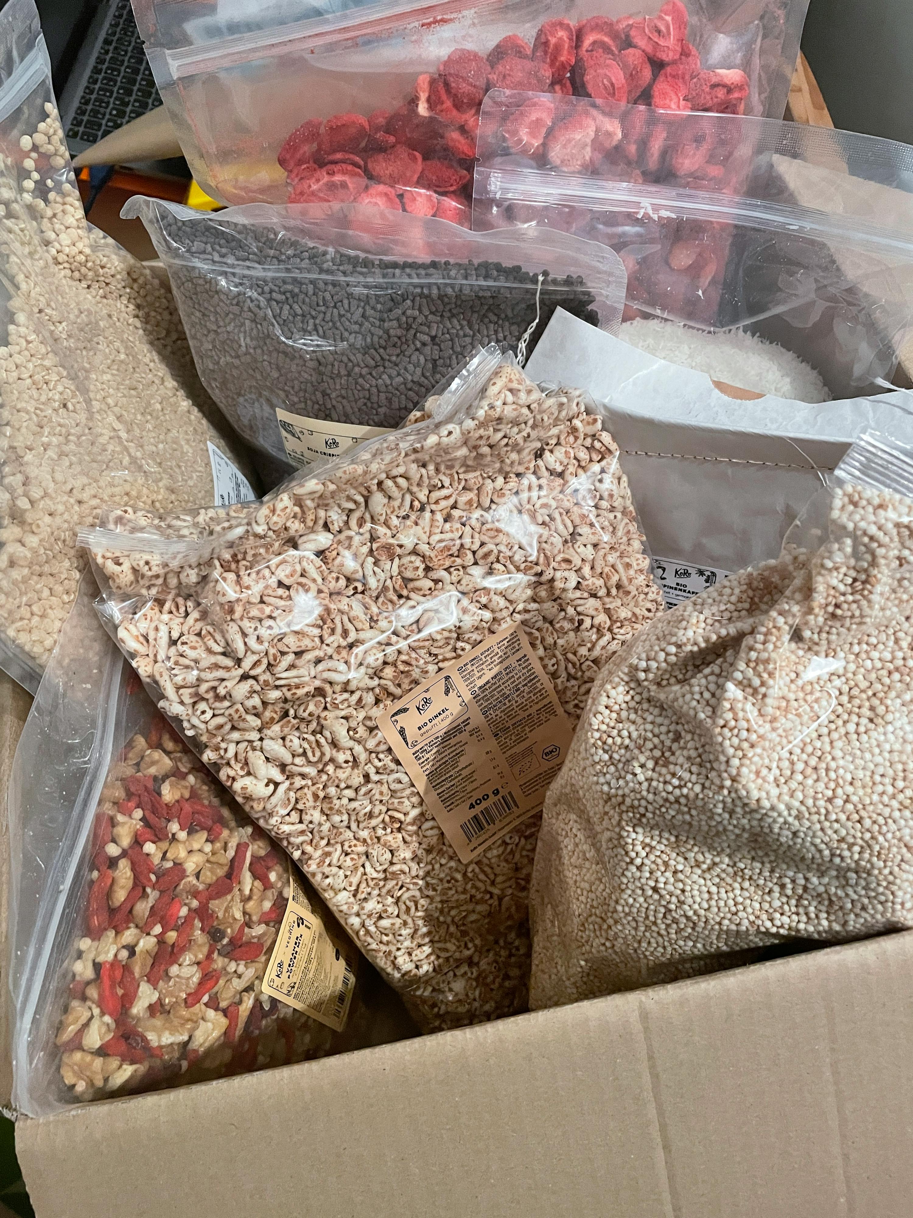 a box filled with a variety of nuts and grains