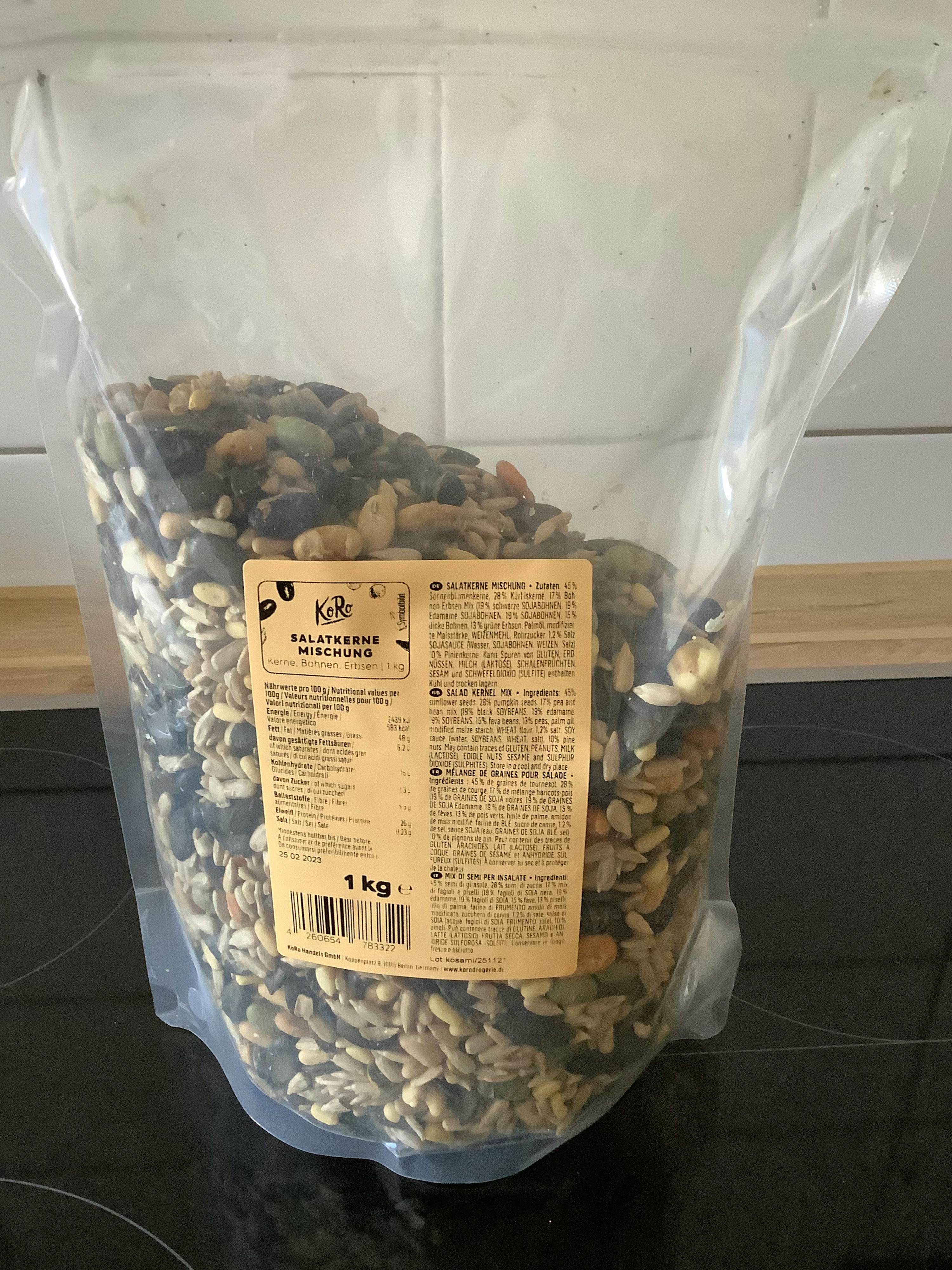 a bag of mixed nuts has a label that says ' kate ' on it