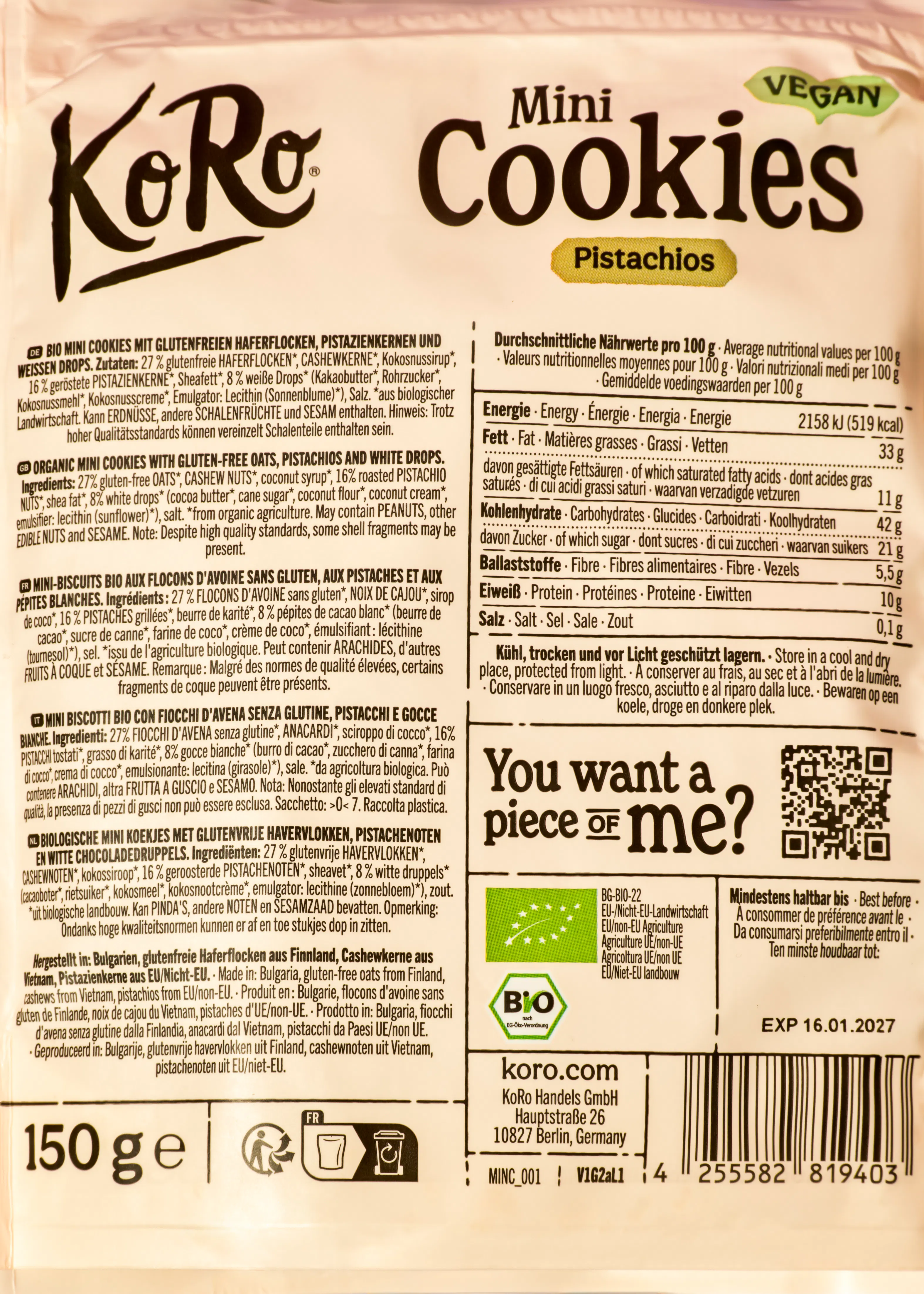 eine verpackung von koro mini cookies mit pistazien, die als vegan und bio gekennzeichnet ist und nährwertangaben sowie produktinformationen enthält.
