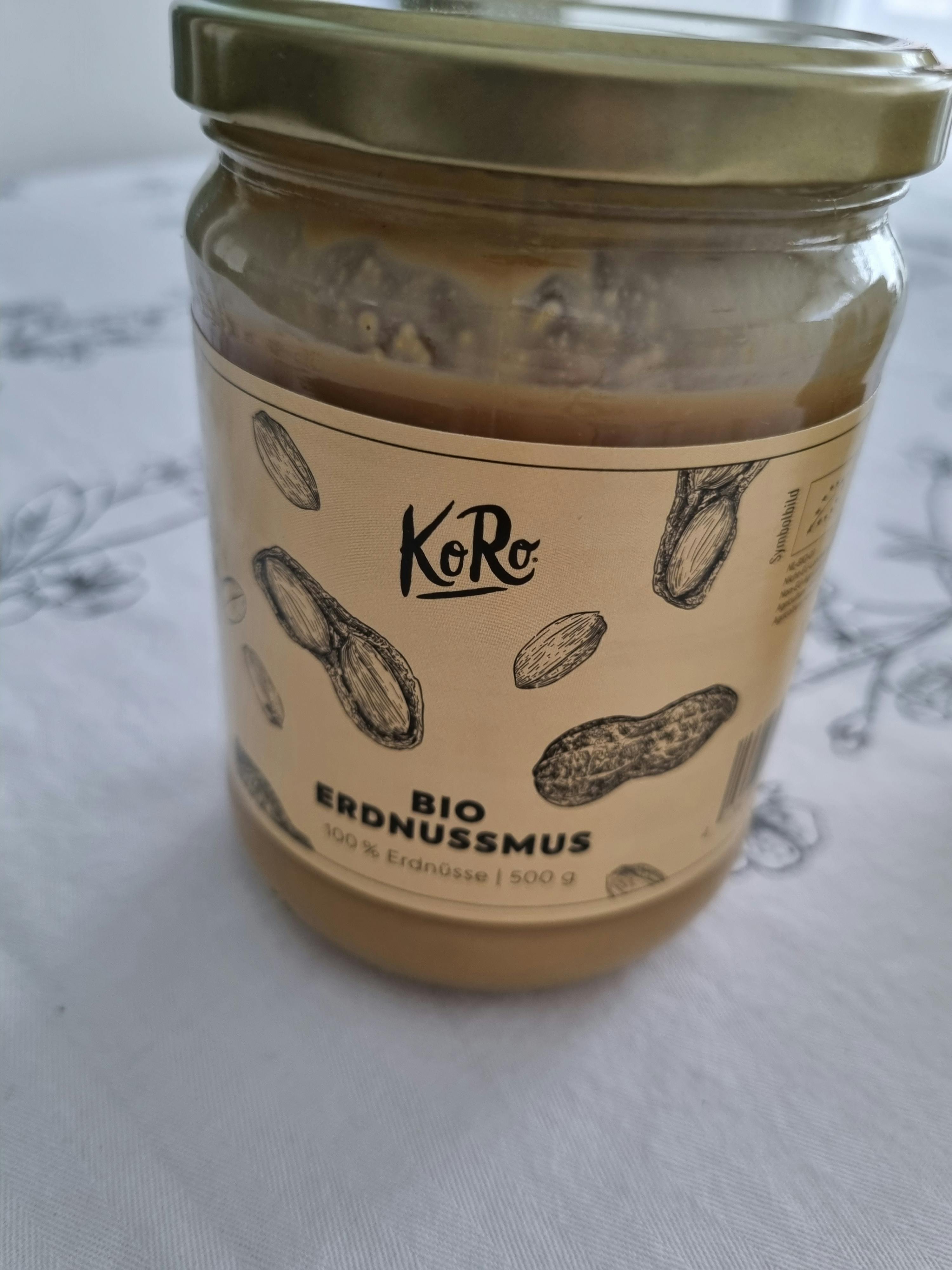 a jar of bio erdnussmus is sitting on a table