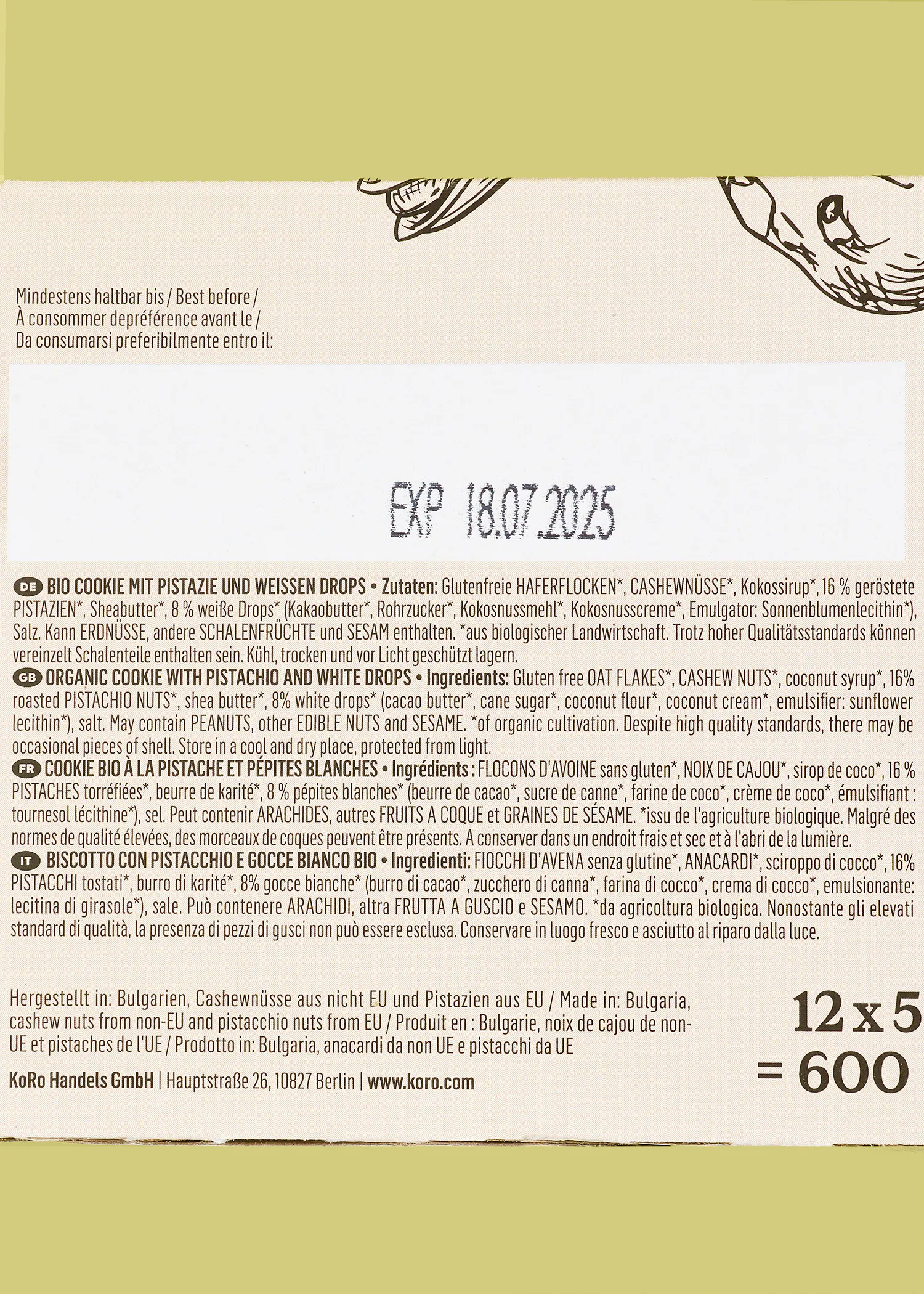 die Rückseite einer Schachtel Bio-Kekse mit pistazie und weißen Tropfen