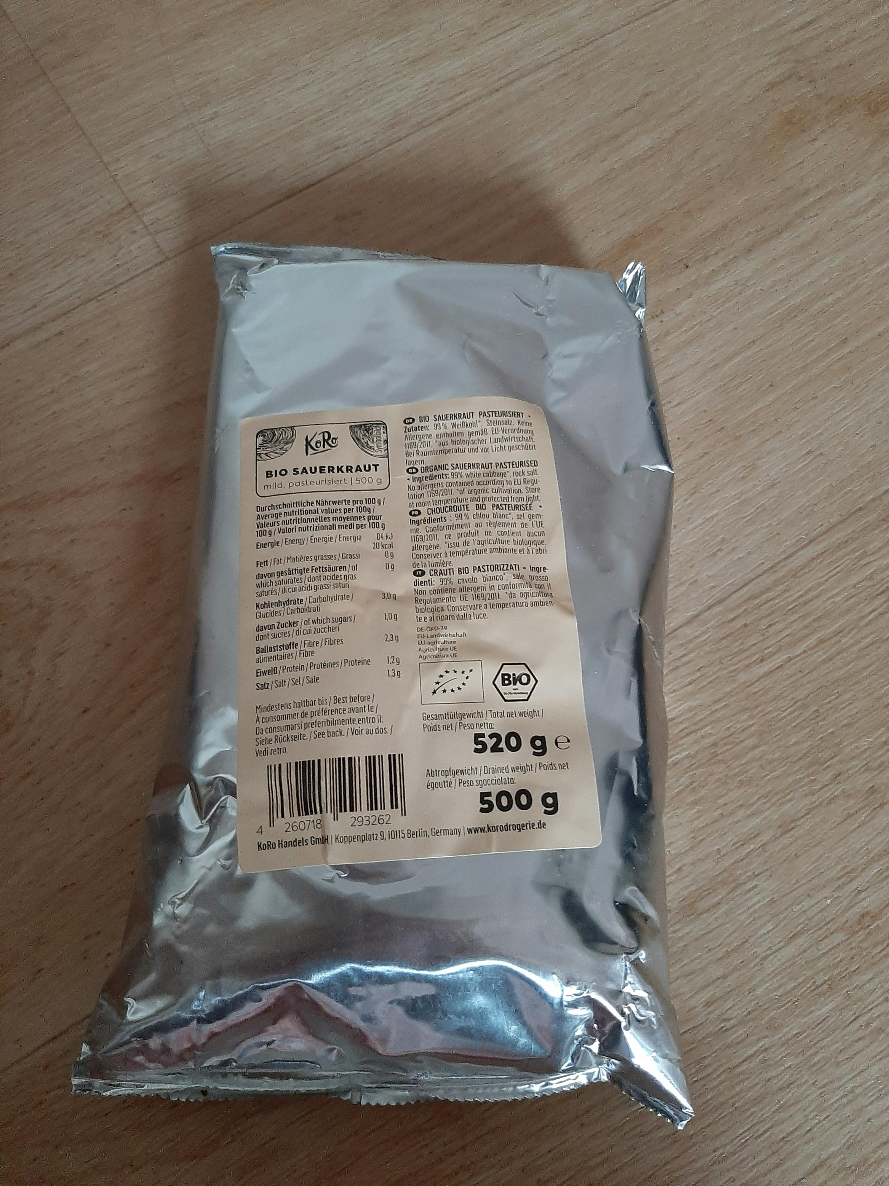 a 500 g bag of bio ingredients sits on a wooden table