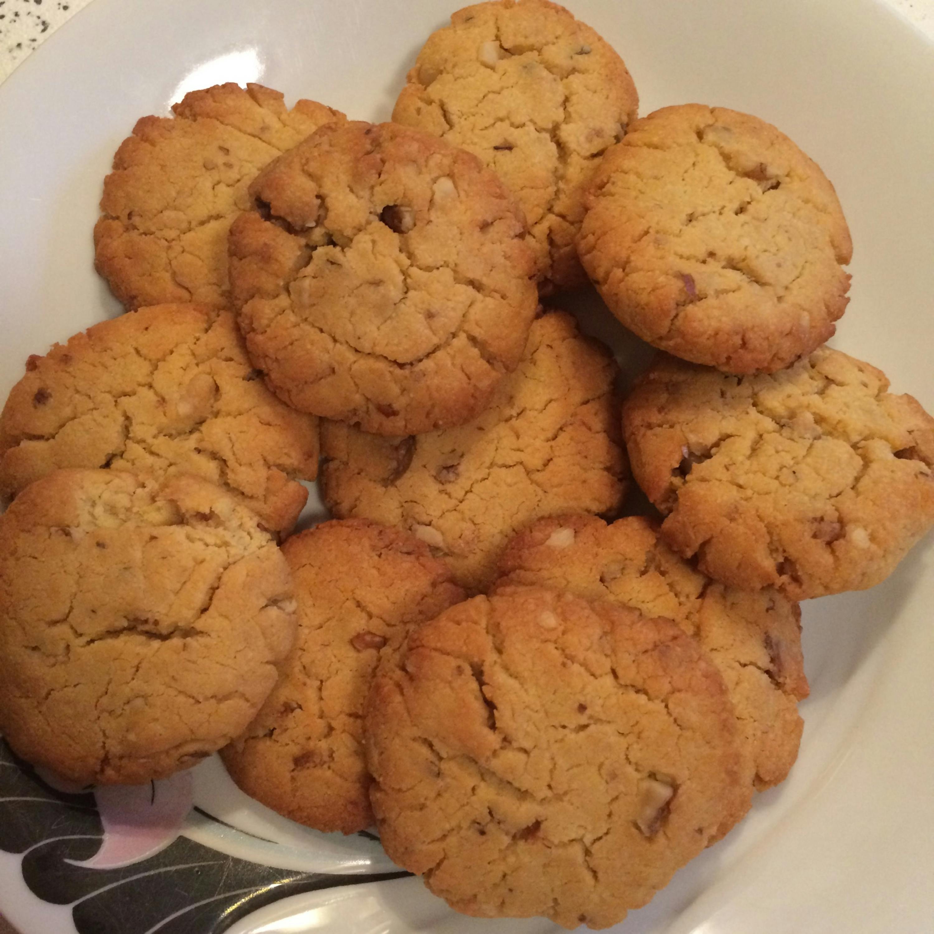 a plate of cookies with a floral design on it