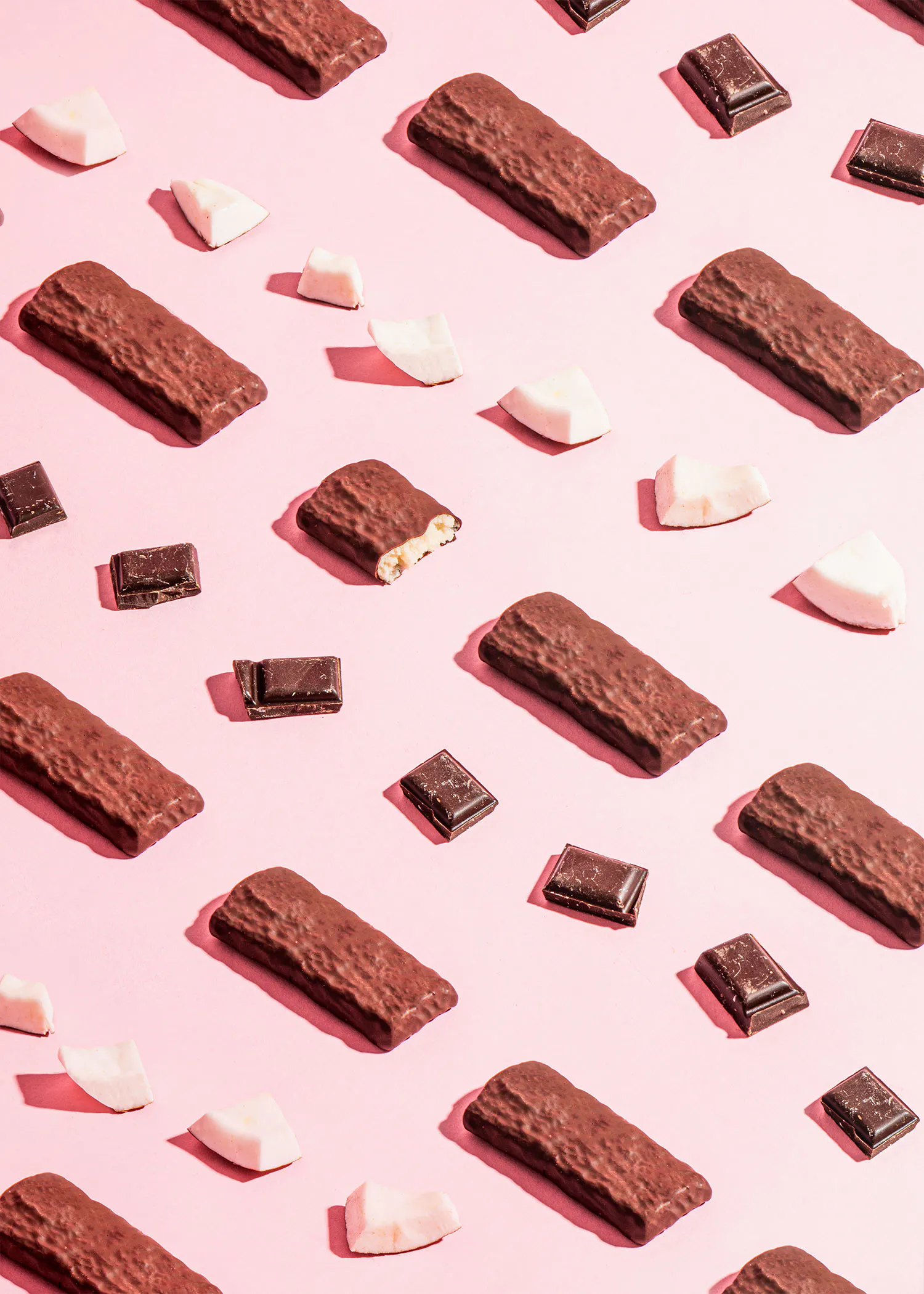 un motif de barres de chocolat sur fond rose