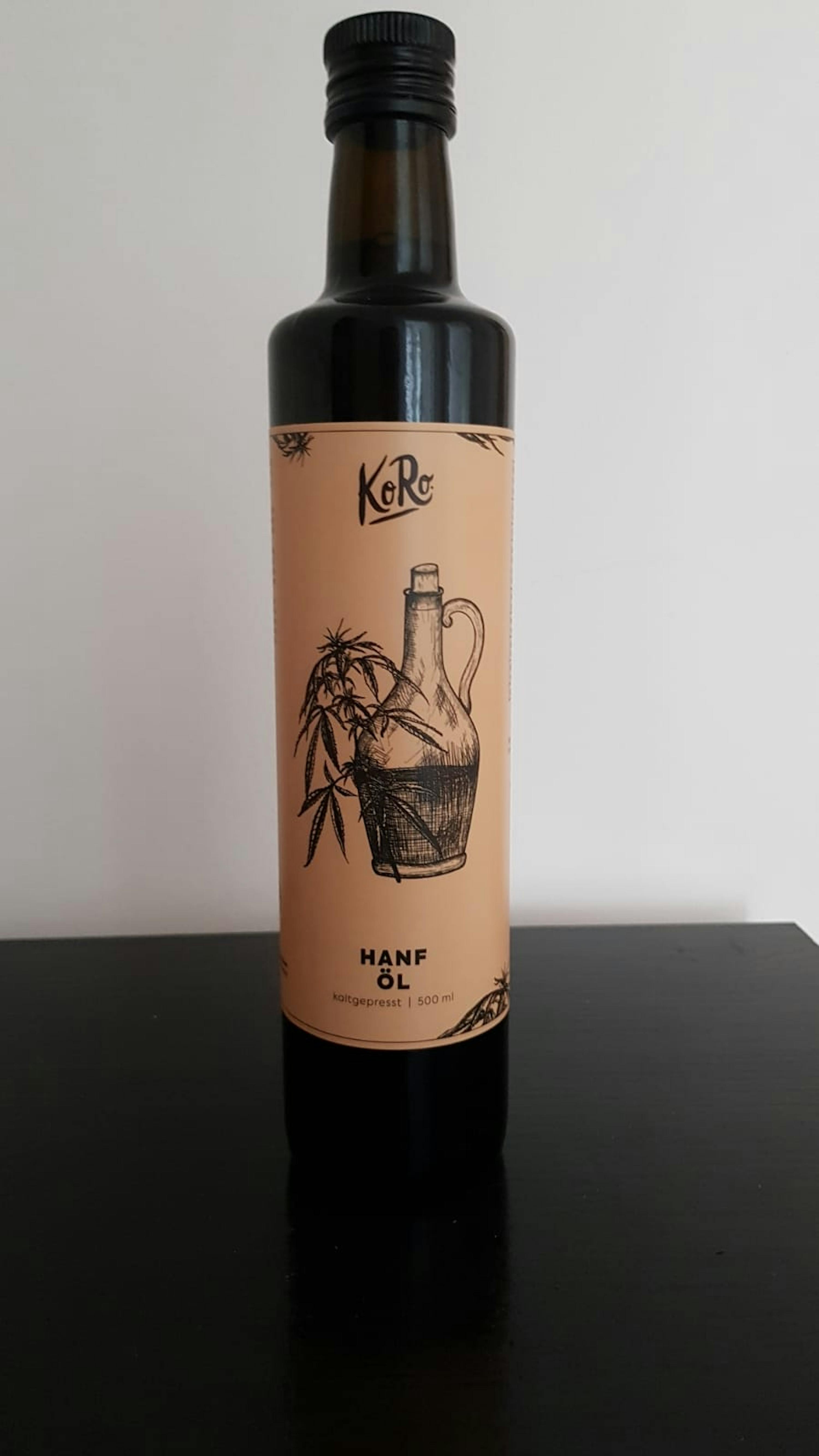 a bottle of koro hanf öl sits on a table