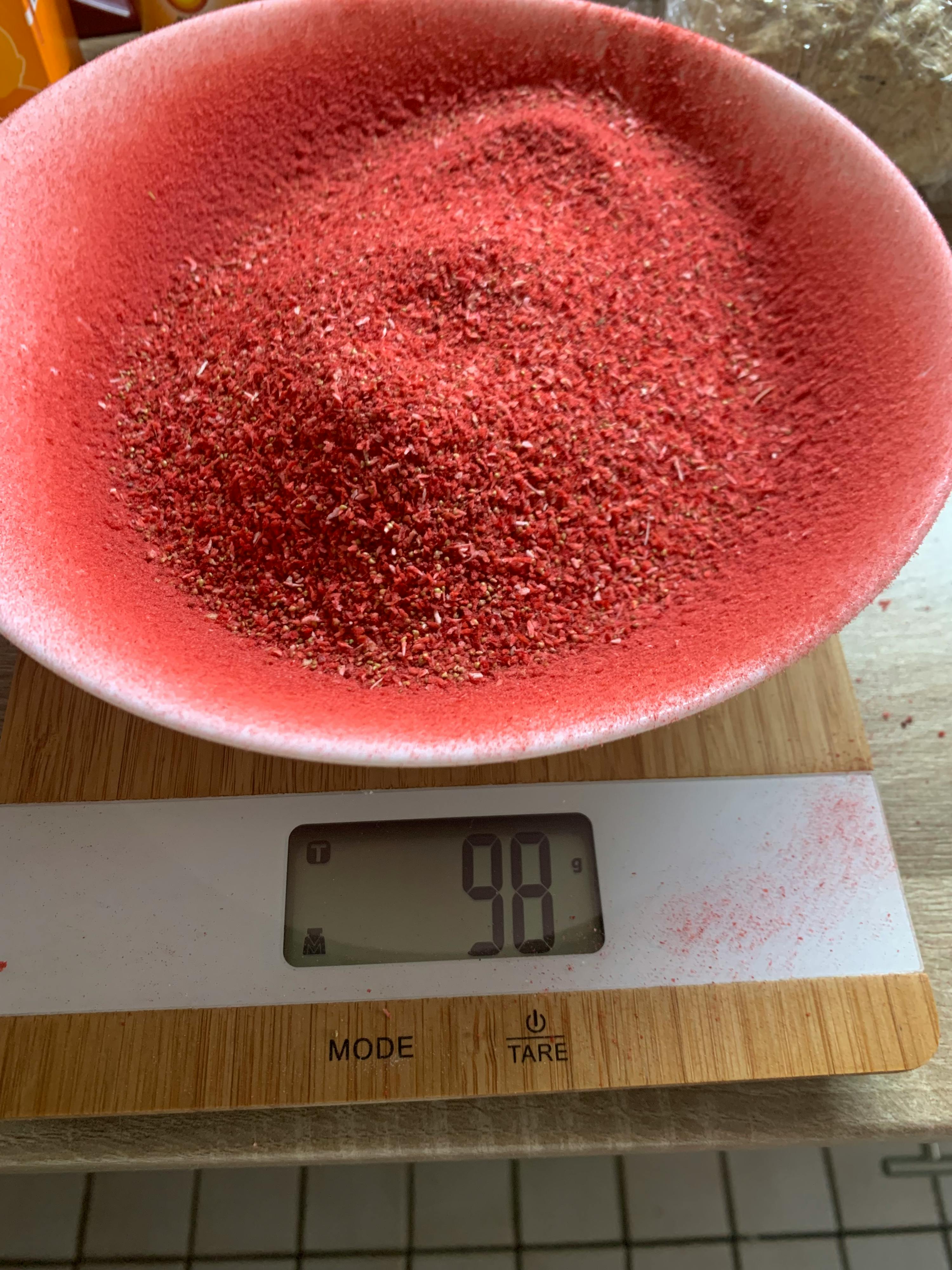 a digital scale has the number 69 on the screen