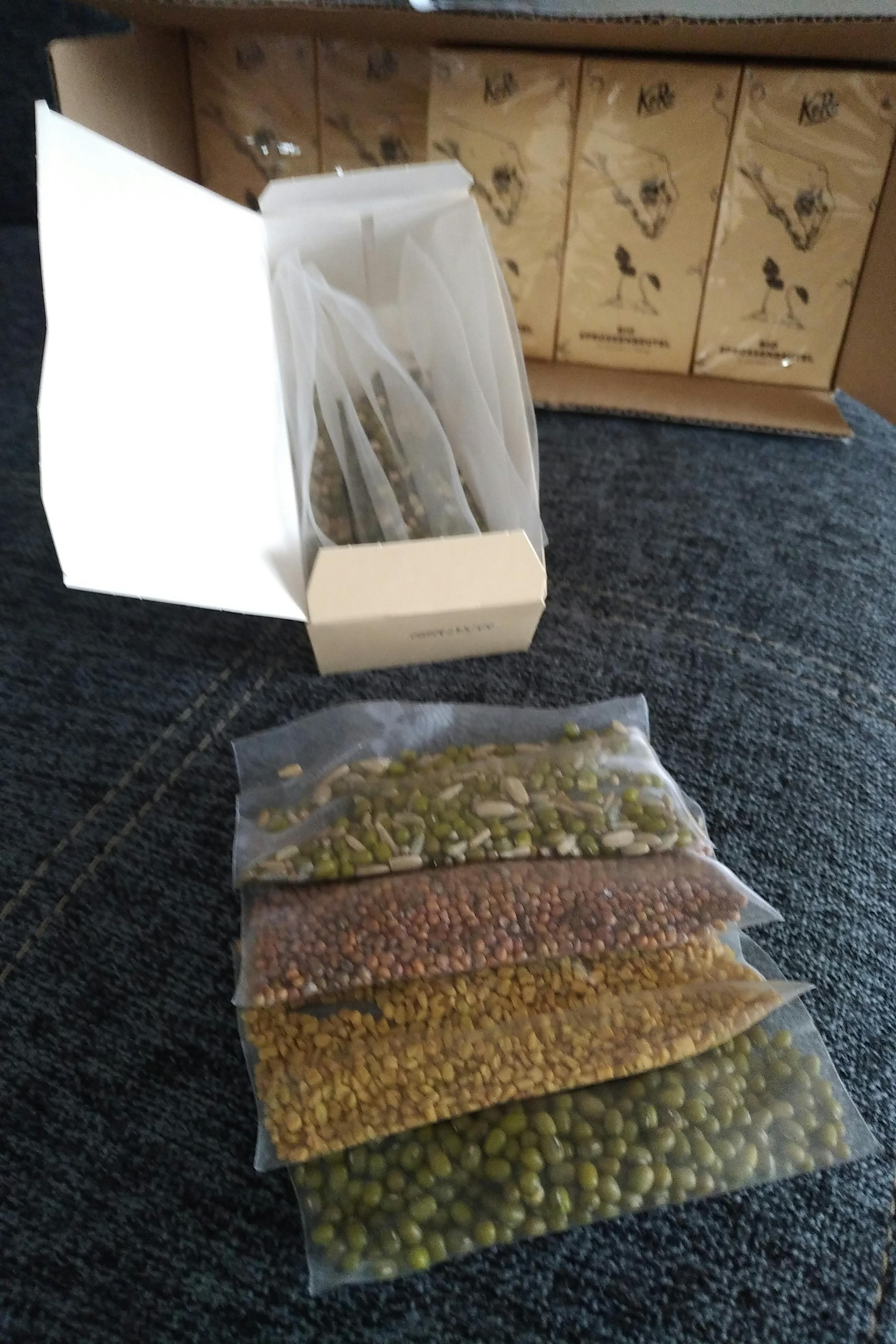 a box of kelp seeds sits on a couch