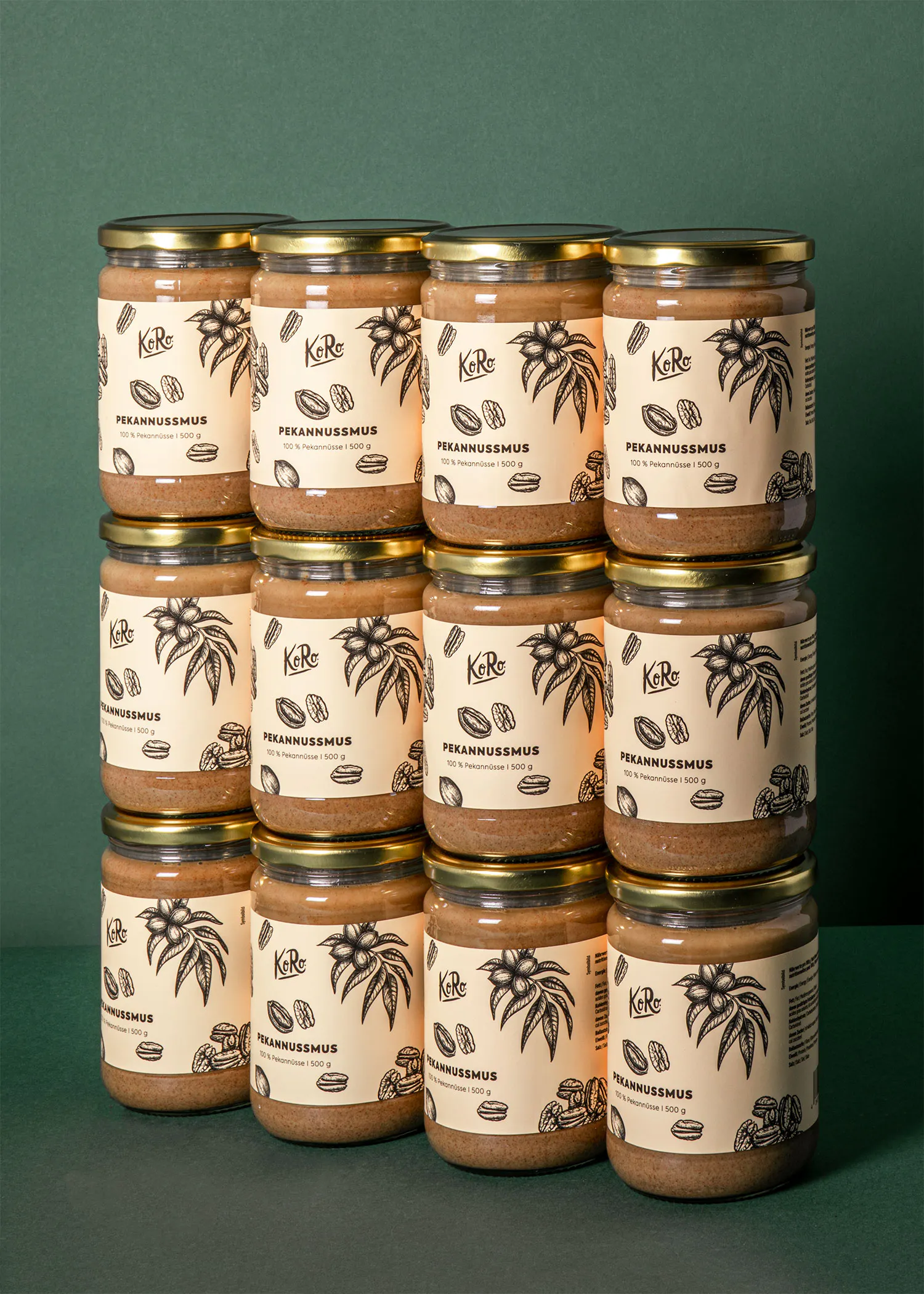 twelve jars of pecannusmus are stacked on top of each other